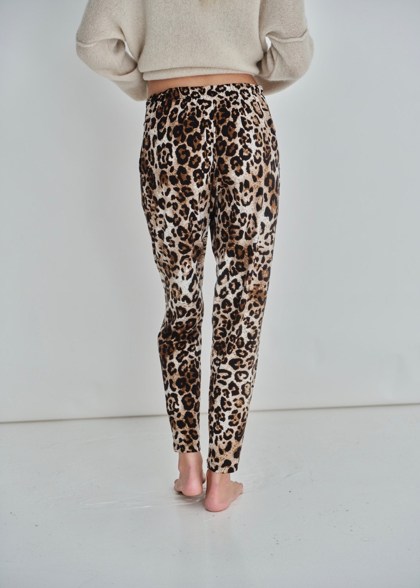 View our Classic Front Pleat Lounge Pants in Animal Print - by Tribute Store