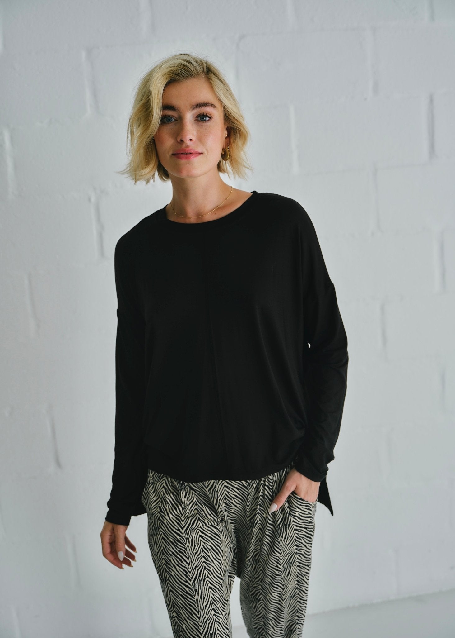 View our Classic Tee With Flossing Detail In Black - by Tribute Store