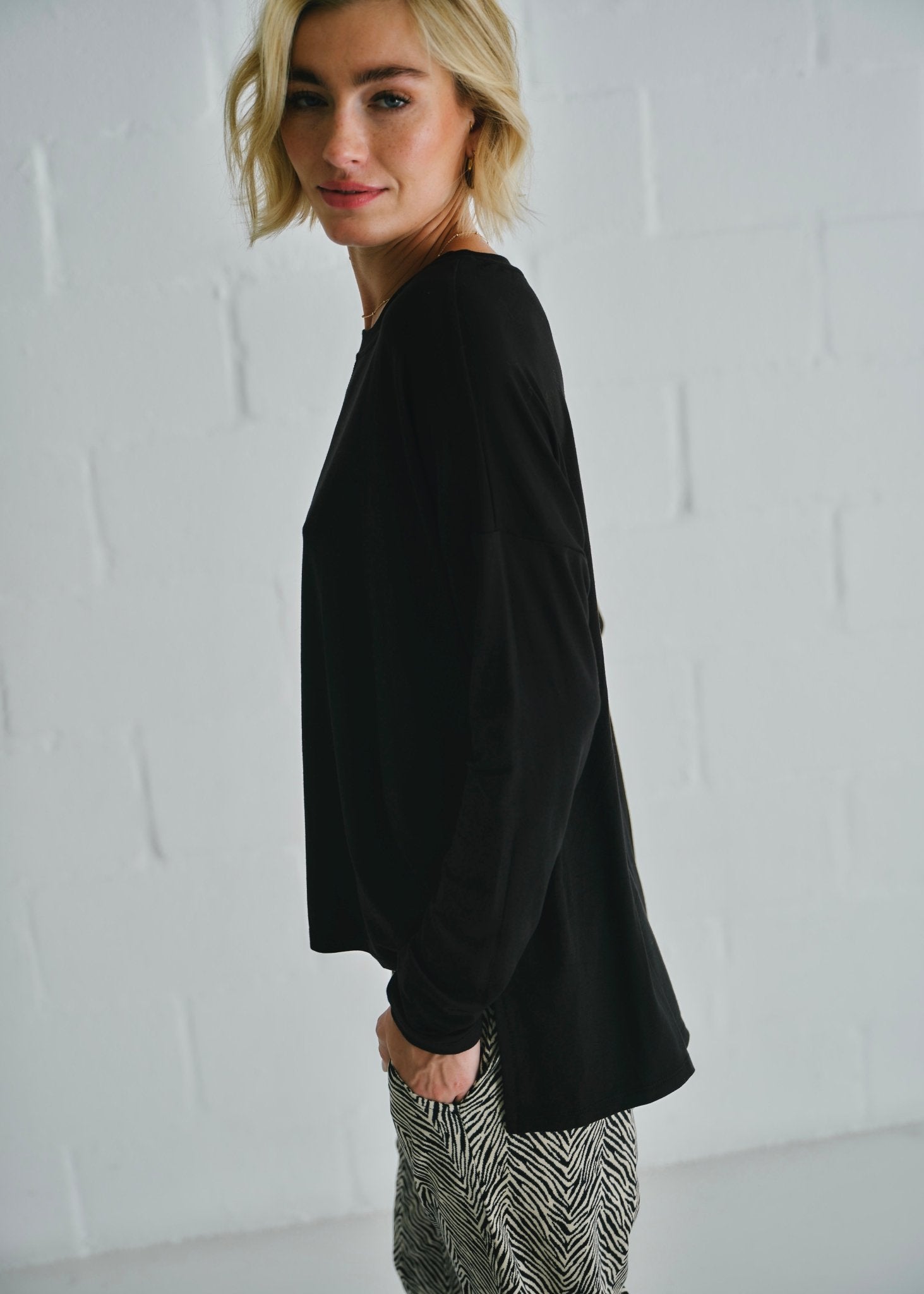 View our Classic Tee With Flossing Detail In Black - by Tribute Store