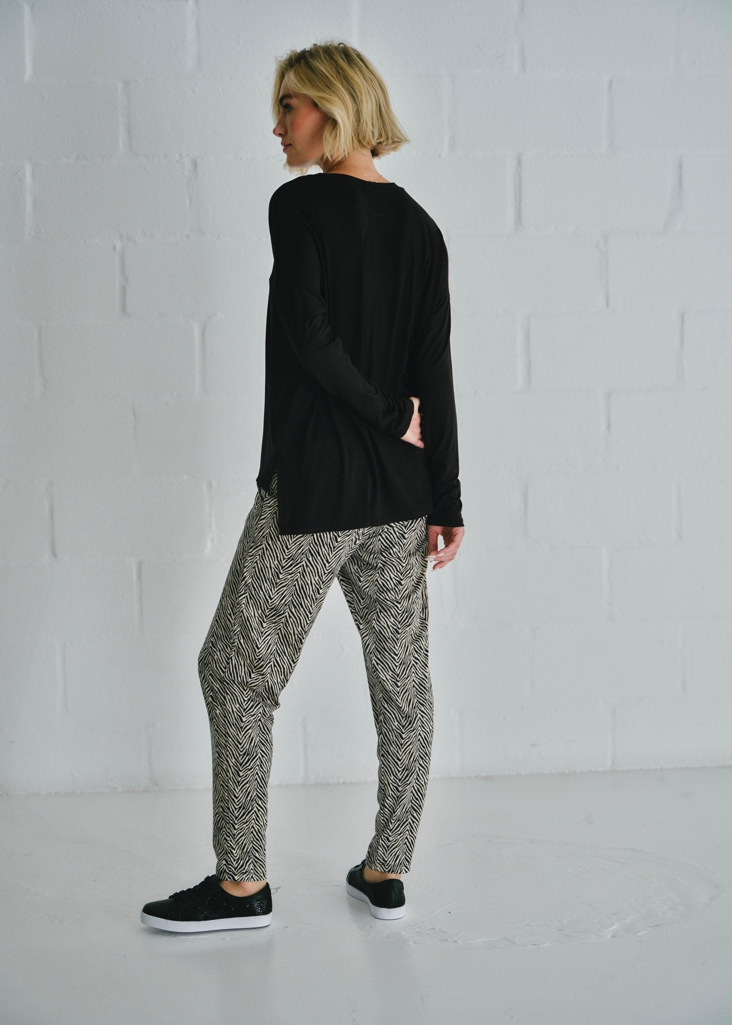 View our Classic Tee With Flossing Detail In Black - by Tribute Store