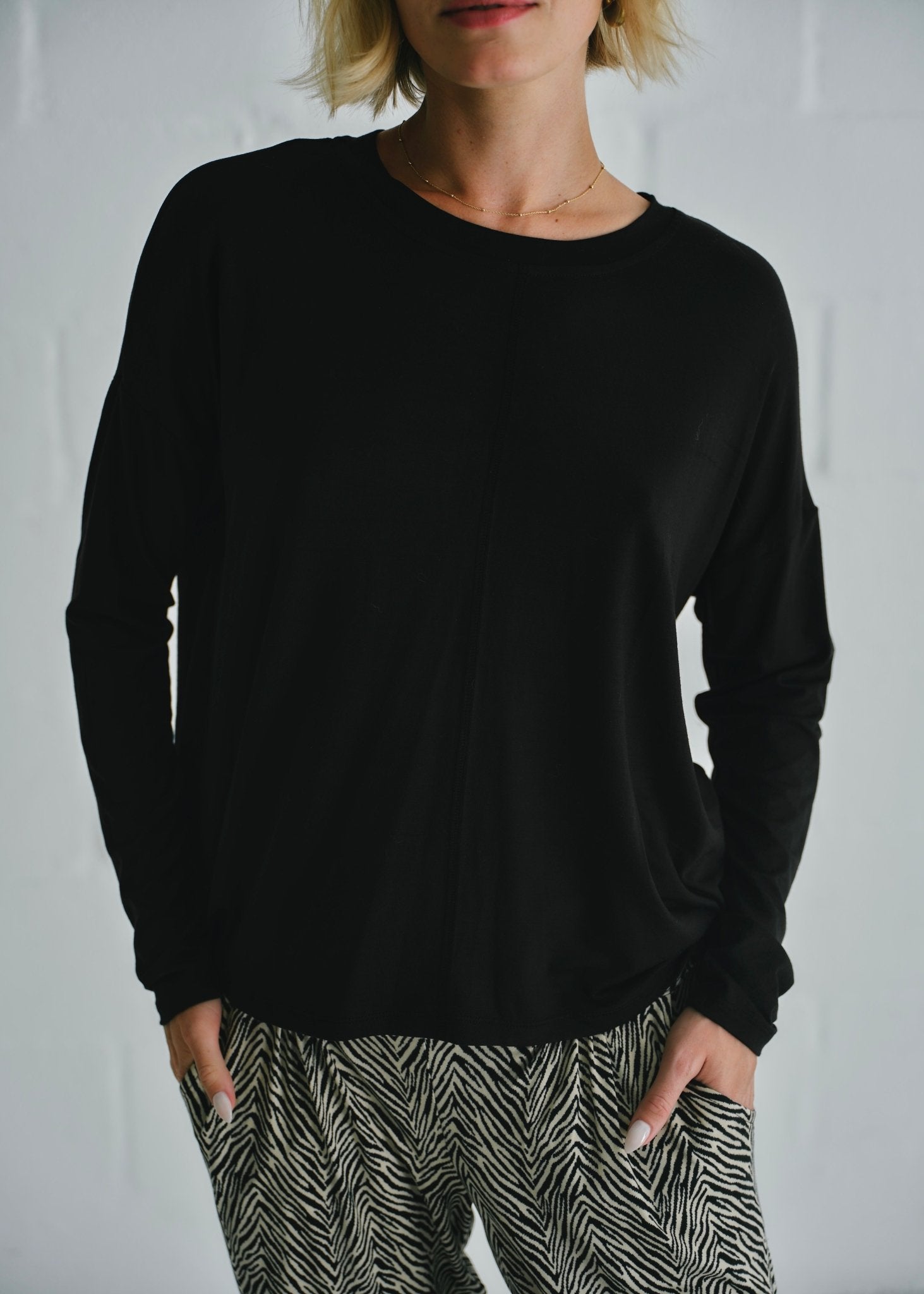 View our Classic Tee With Flossing Detail In Black - by Tribute Store