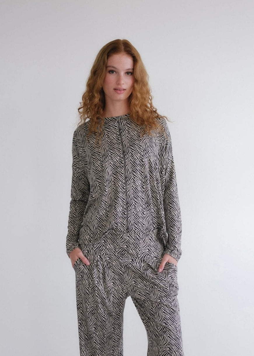 View our Classic Tee With Flossing Detail In Safari Sketch Print - by Tribute Store