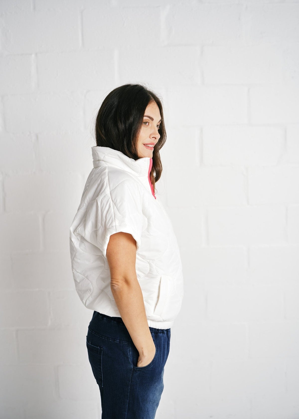View our Cortina Quilted Short Sleeve Puffer Jacket With Pink Zip In White - by Tribute Store