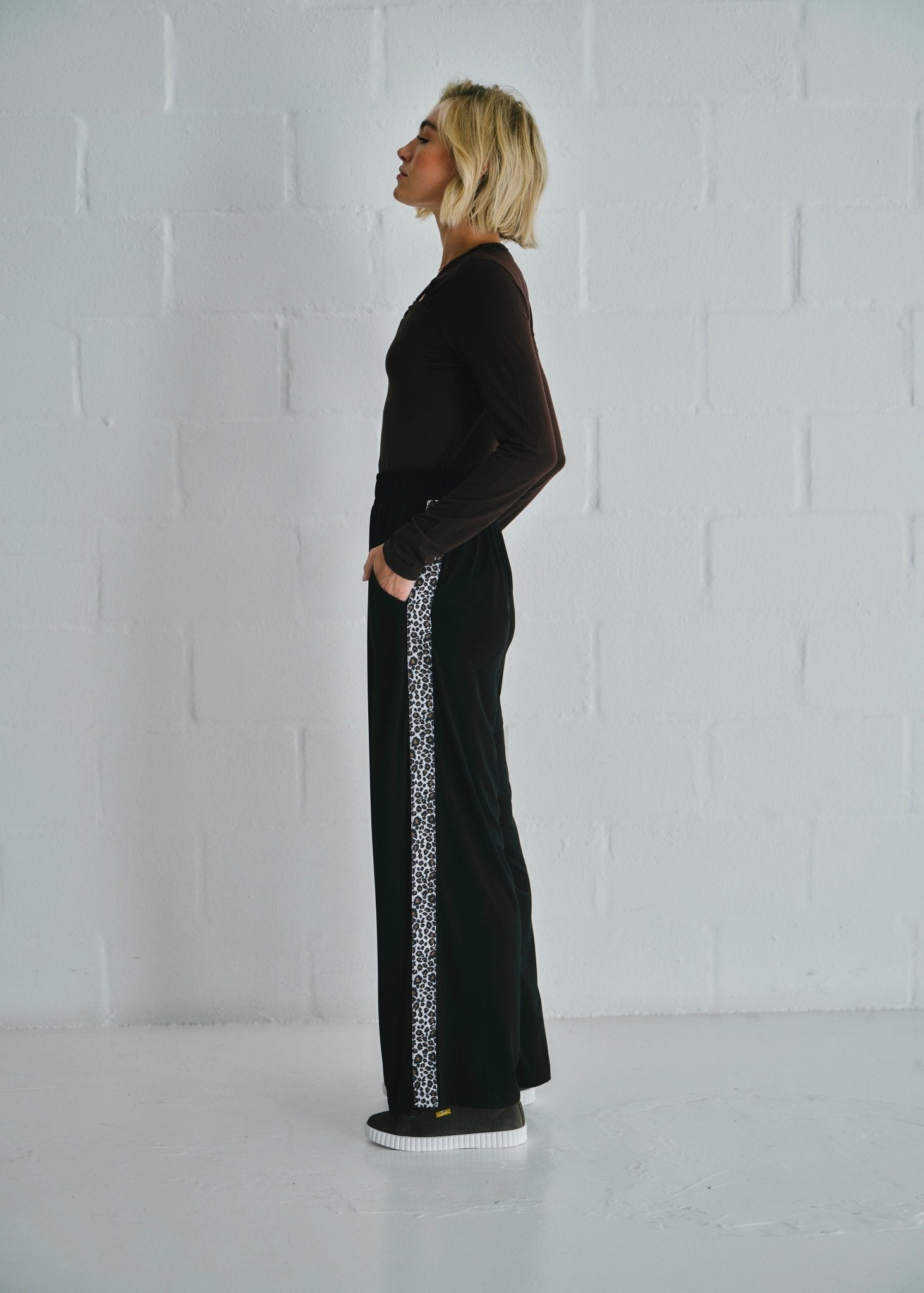 View our Ella Wide Leg Pants In Black With Animal Print - by Tribute Store