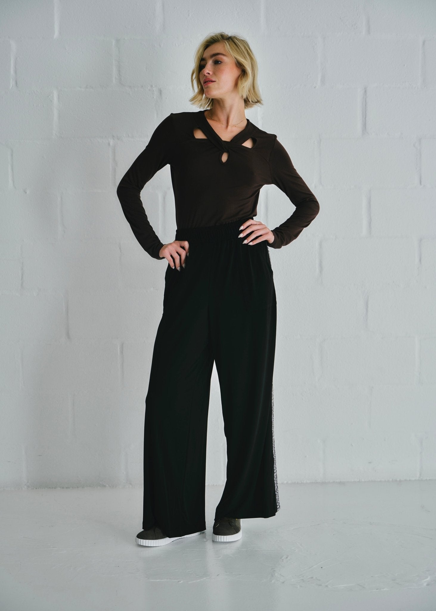 View our Ella Wide Leg Pants In Black With Animal Print - by Tribute Store