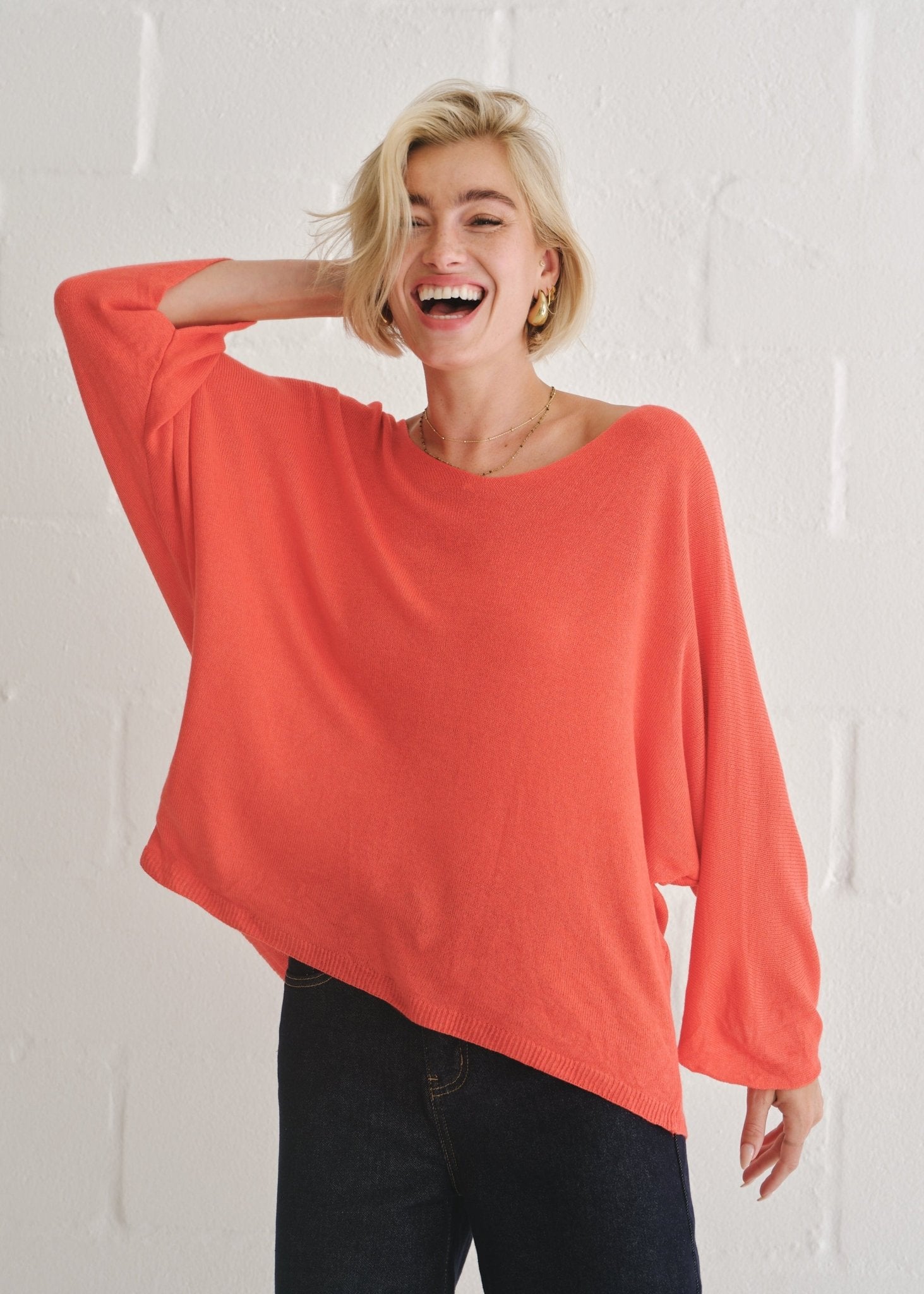 View our Emily Italian Viscose V Neck Batwing Knit In Red - by Tribute Store