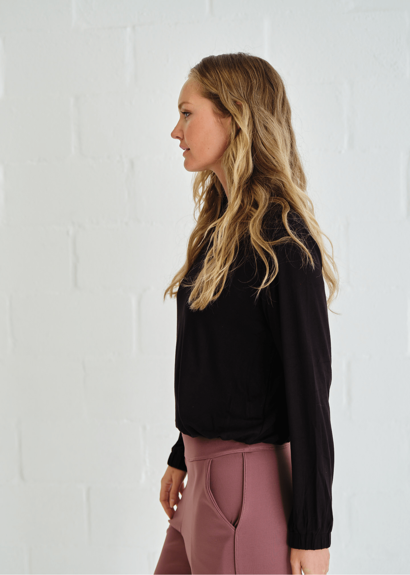 View our Eve Elasticated Hem Top In Black - by Tribute Store