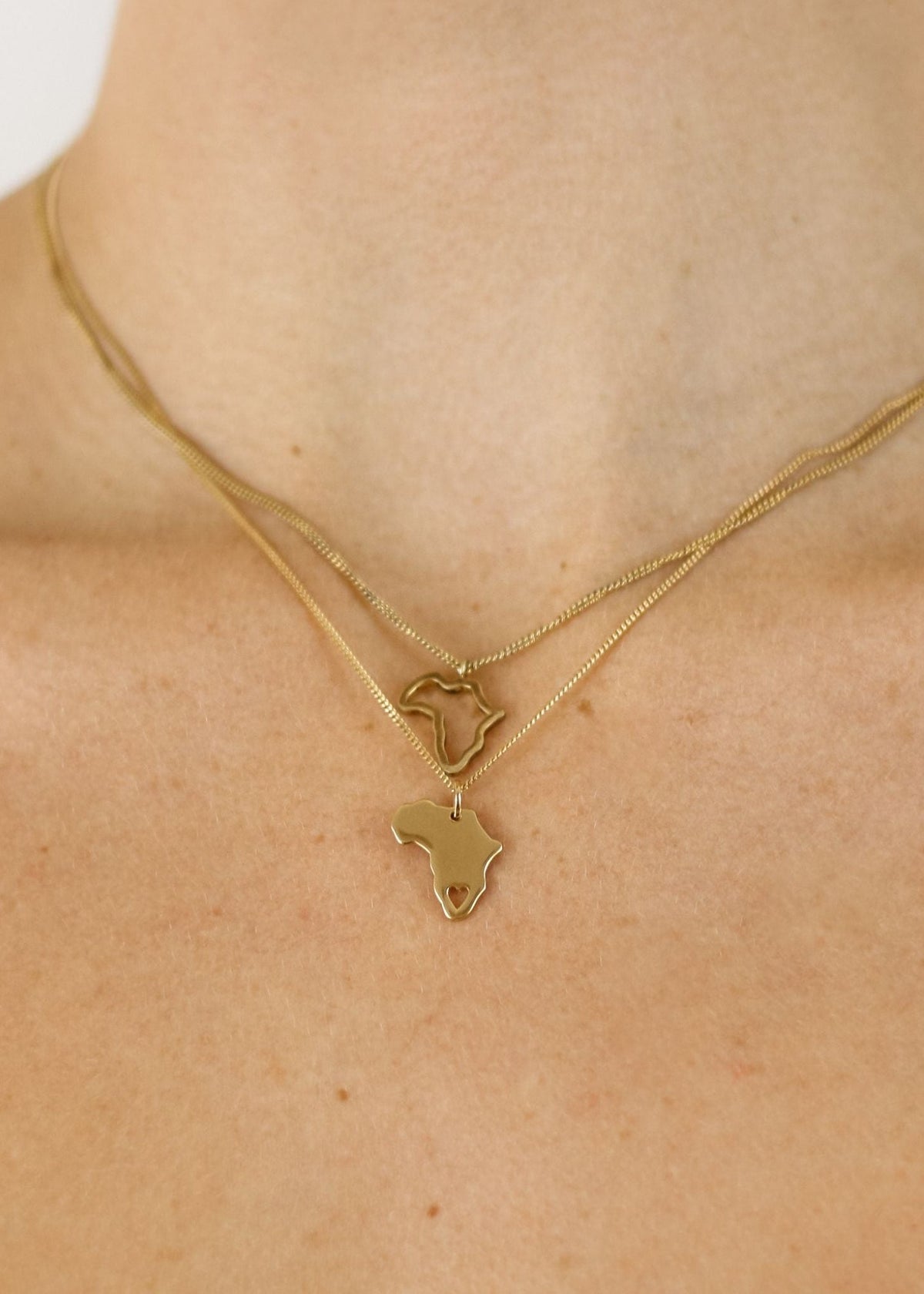 View our Gold Italian Waterproof Africa Outline Necklace - by Tribute Store