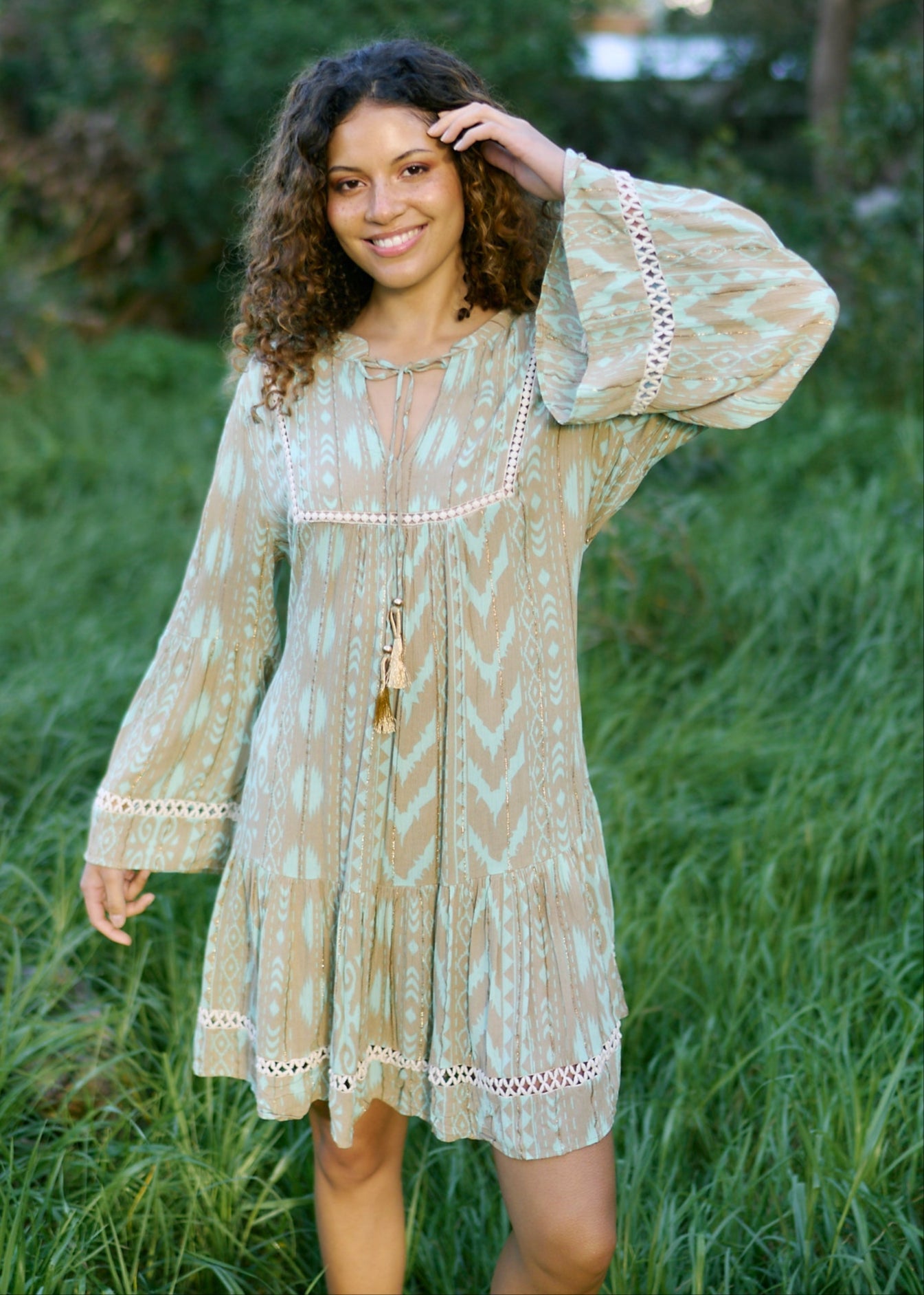 View our Helena Short Bohemian Dress with Tassels in Seagreen - by Tribute Store