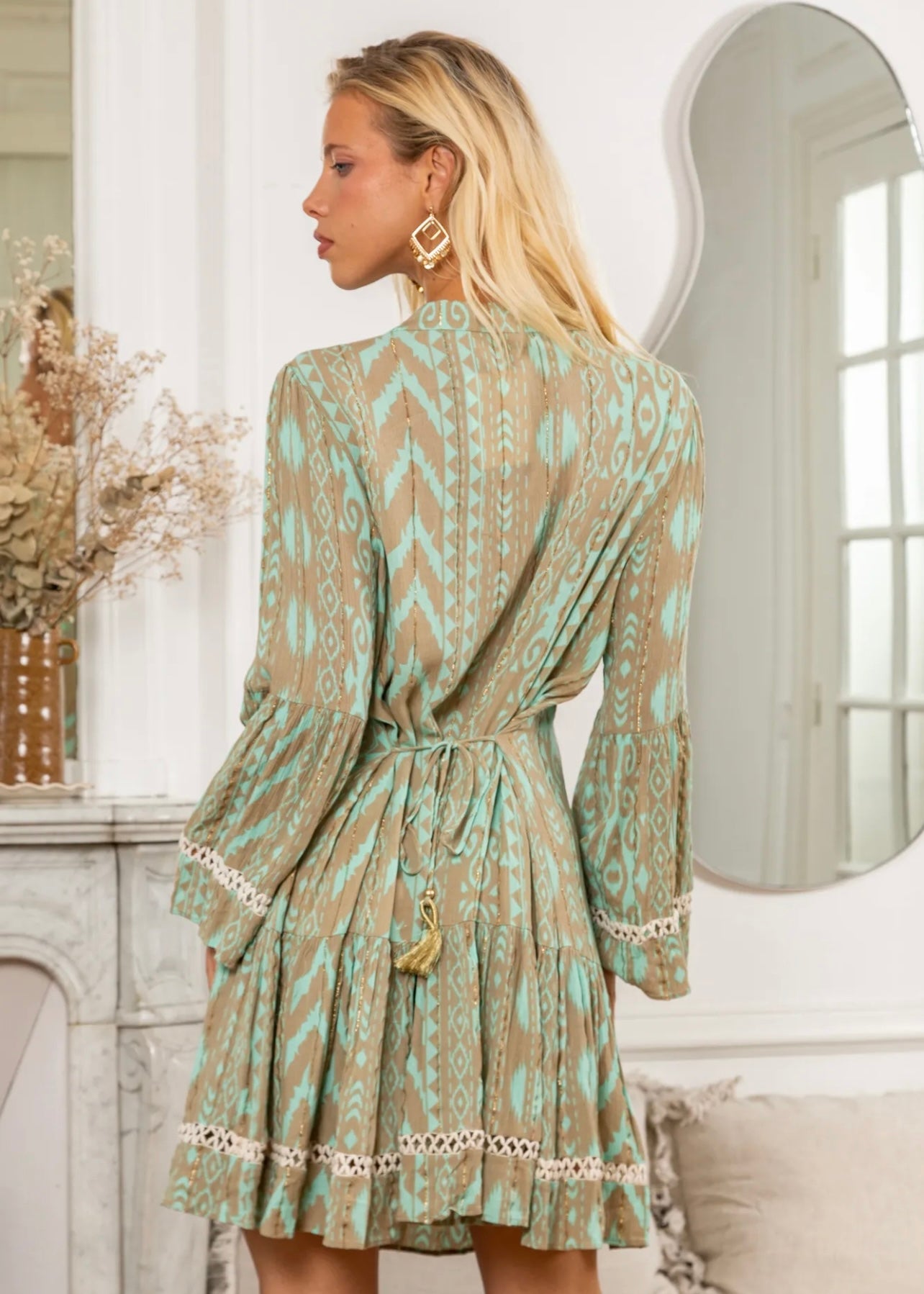 View our Helena Short Bohemian Dress with Tassels in Seagreen - by Tribute Store