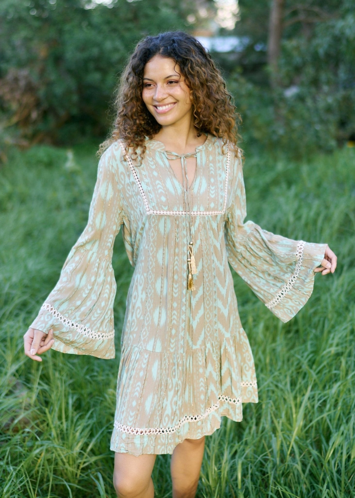 View our Helena Short Bohemian Dress with Tassels in Seagreen - by Tribute Store