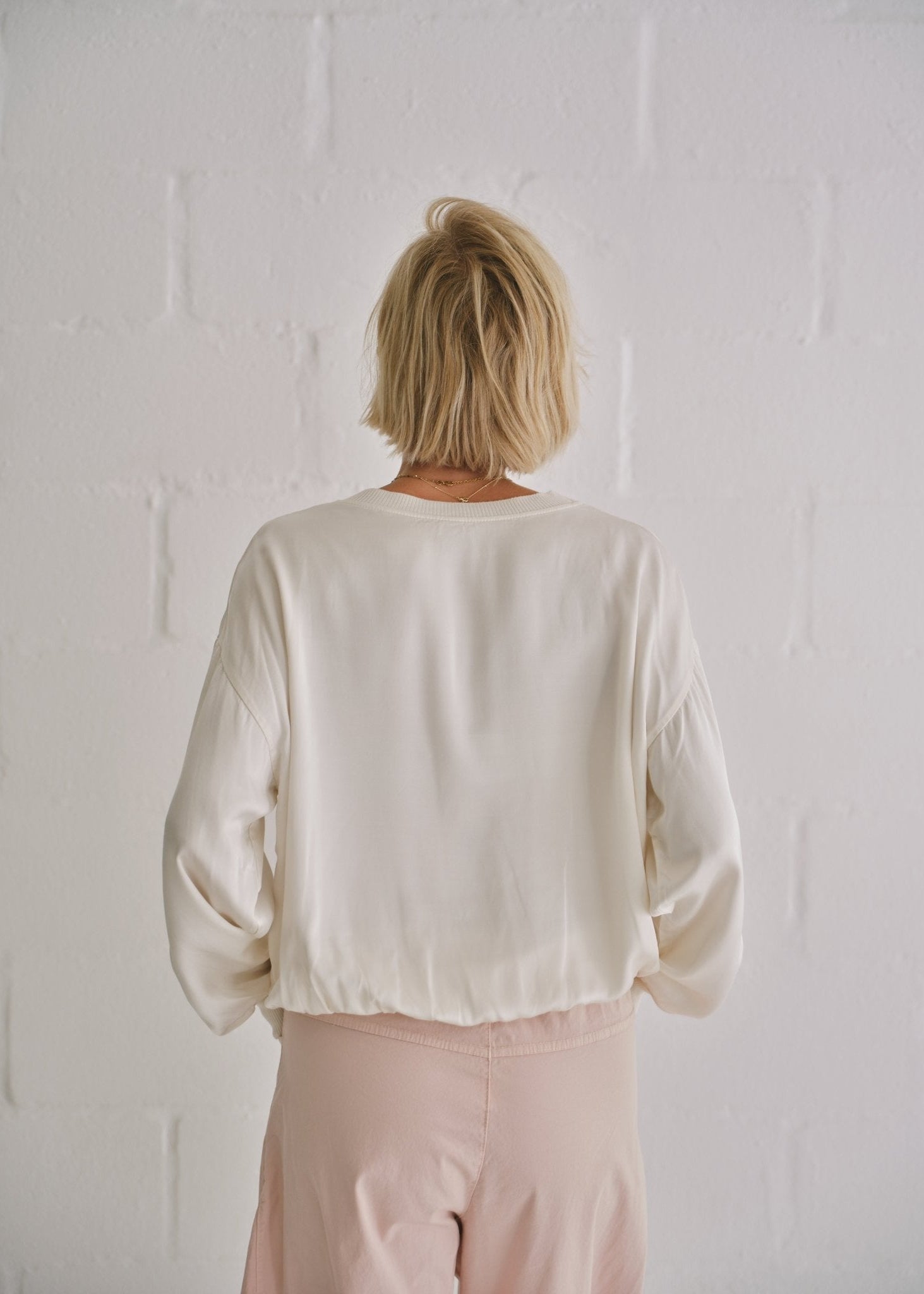 View our Italian Crew Neck Satin Long Sleeved Top In Champagne - by Tribute Store