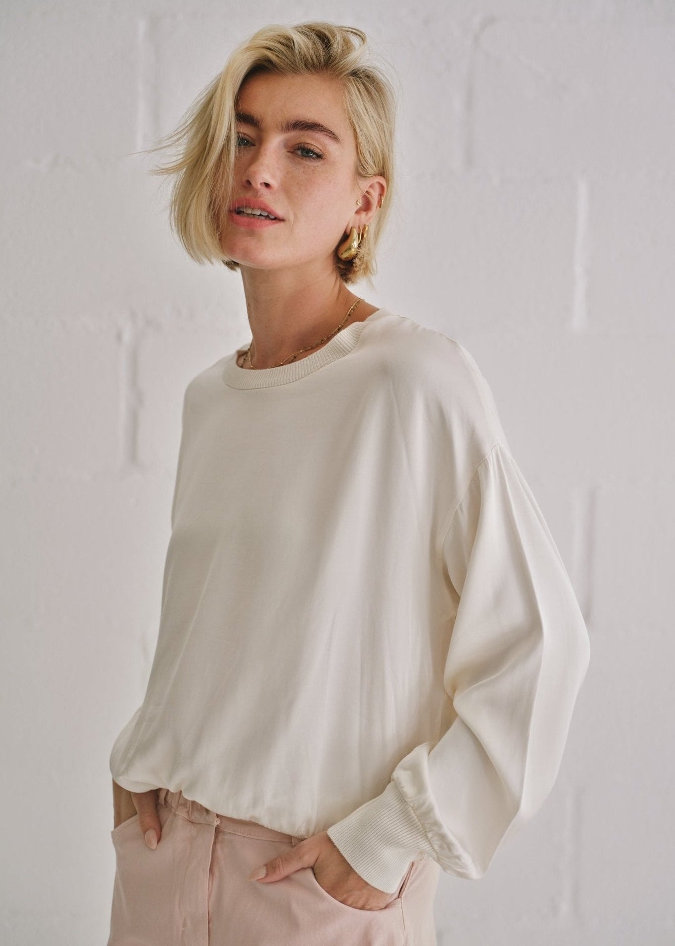 View our Italian Crew Neck Satin Long Sleeved Top In Champagne - by Tribute Store