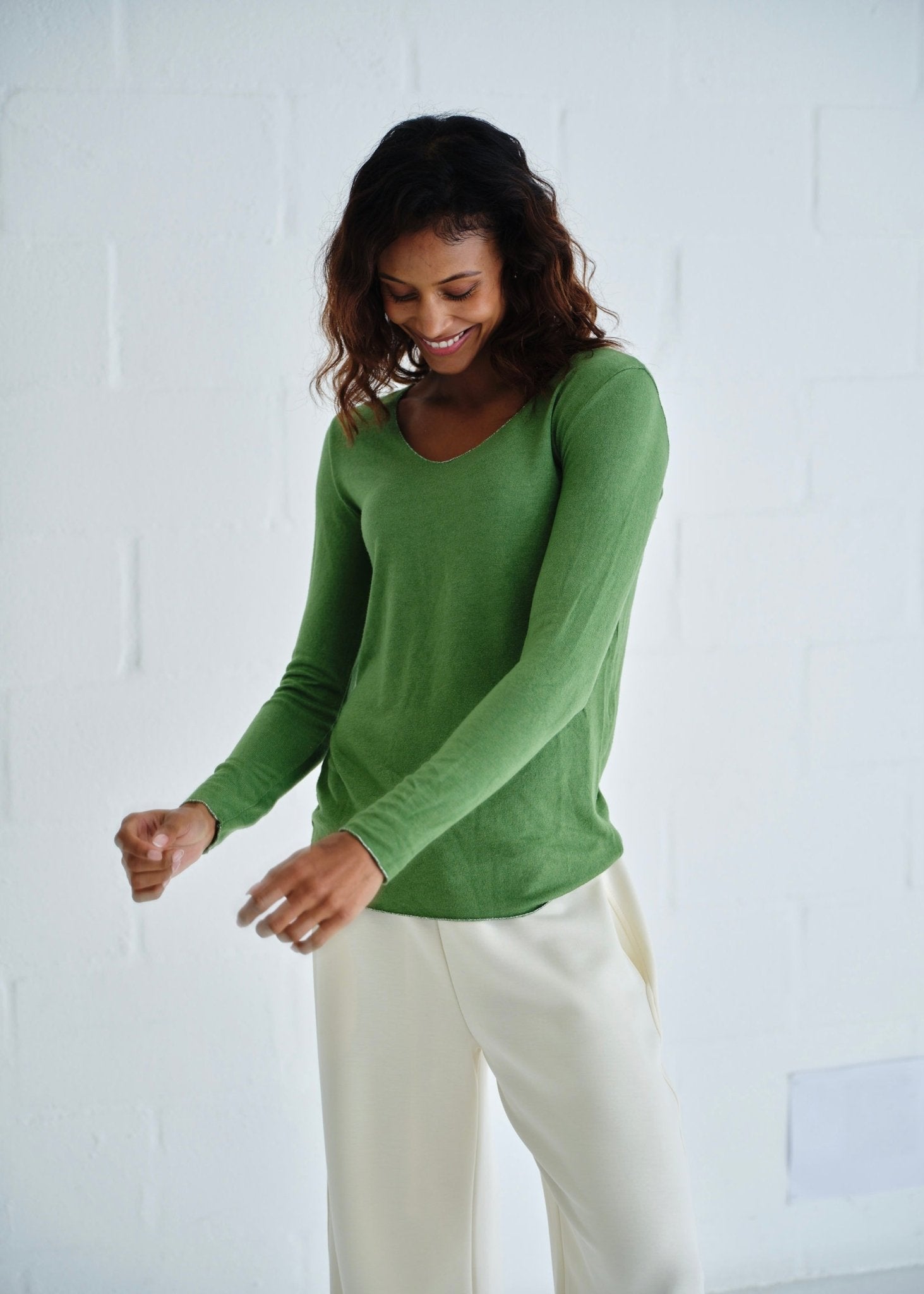 View our Italian Shimmer Edged V Neck Knit In Dark Green - by Tribute Store