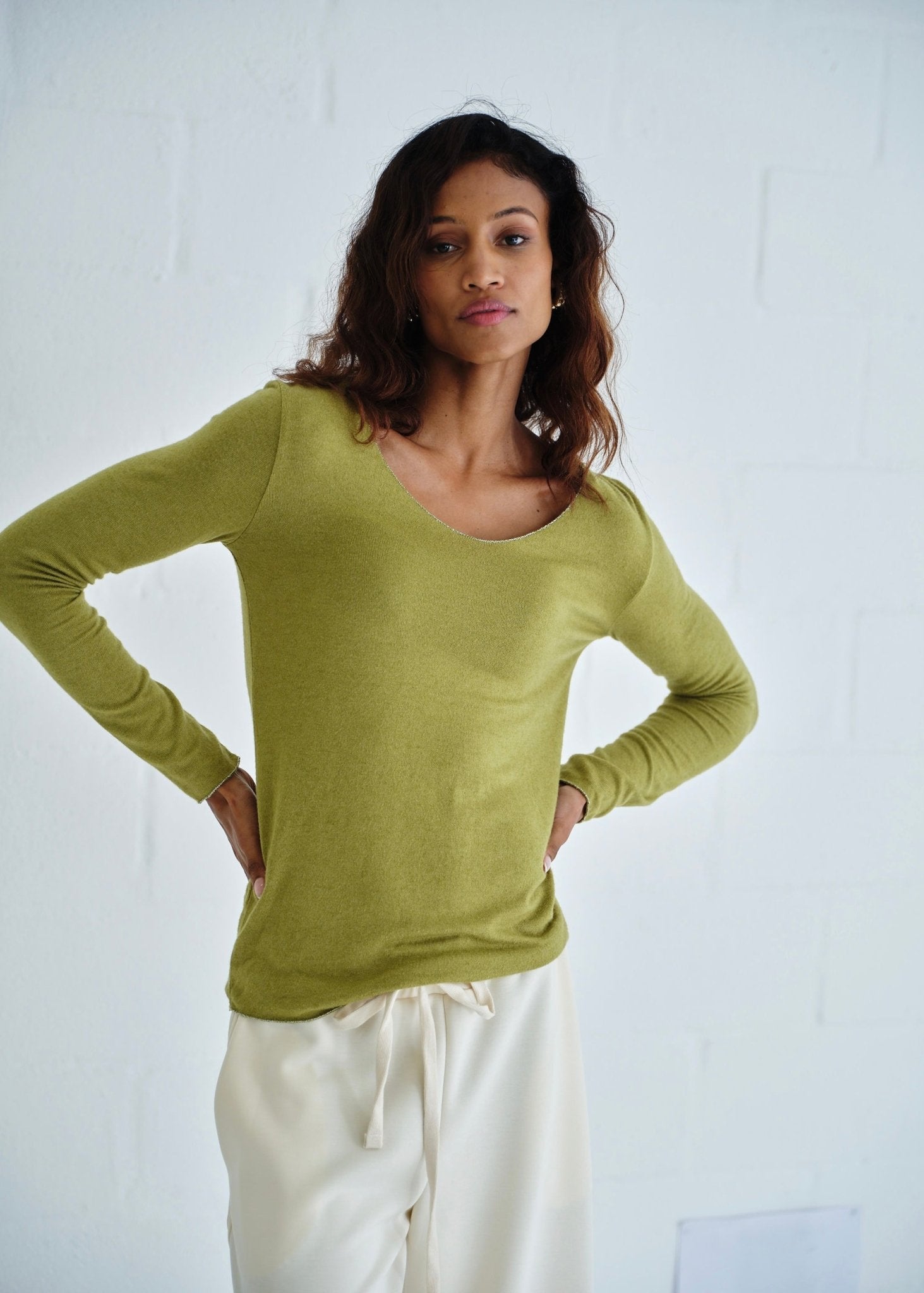 View our Italian Shimmer Edged V Neck Knit In Olive Green - by Tribute Store