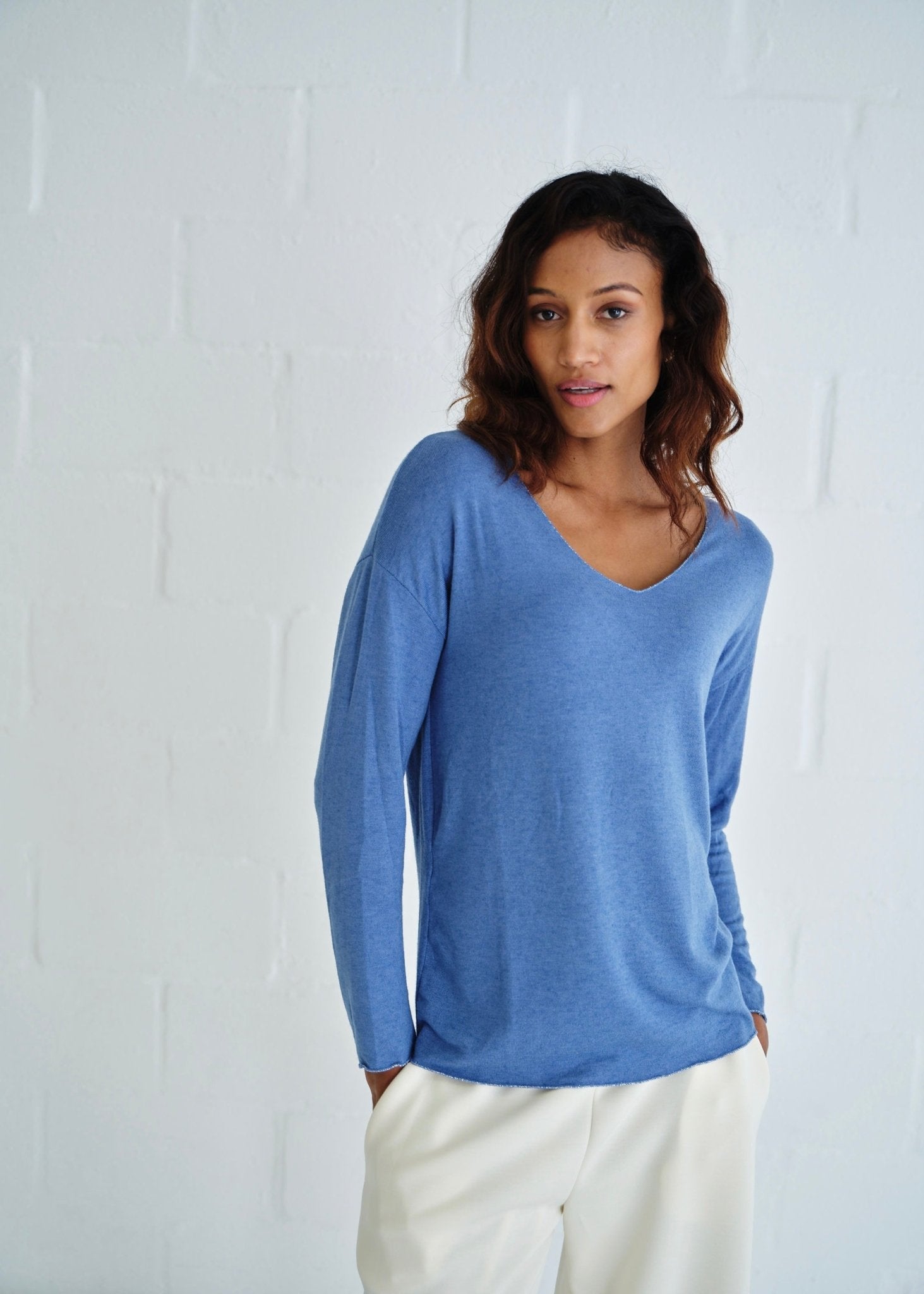 View our Italian Shimmer Edged V Neck Knit In Sky Blue - by Tribute Store