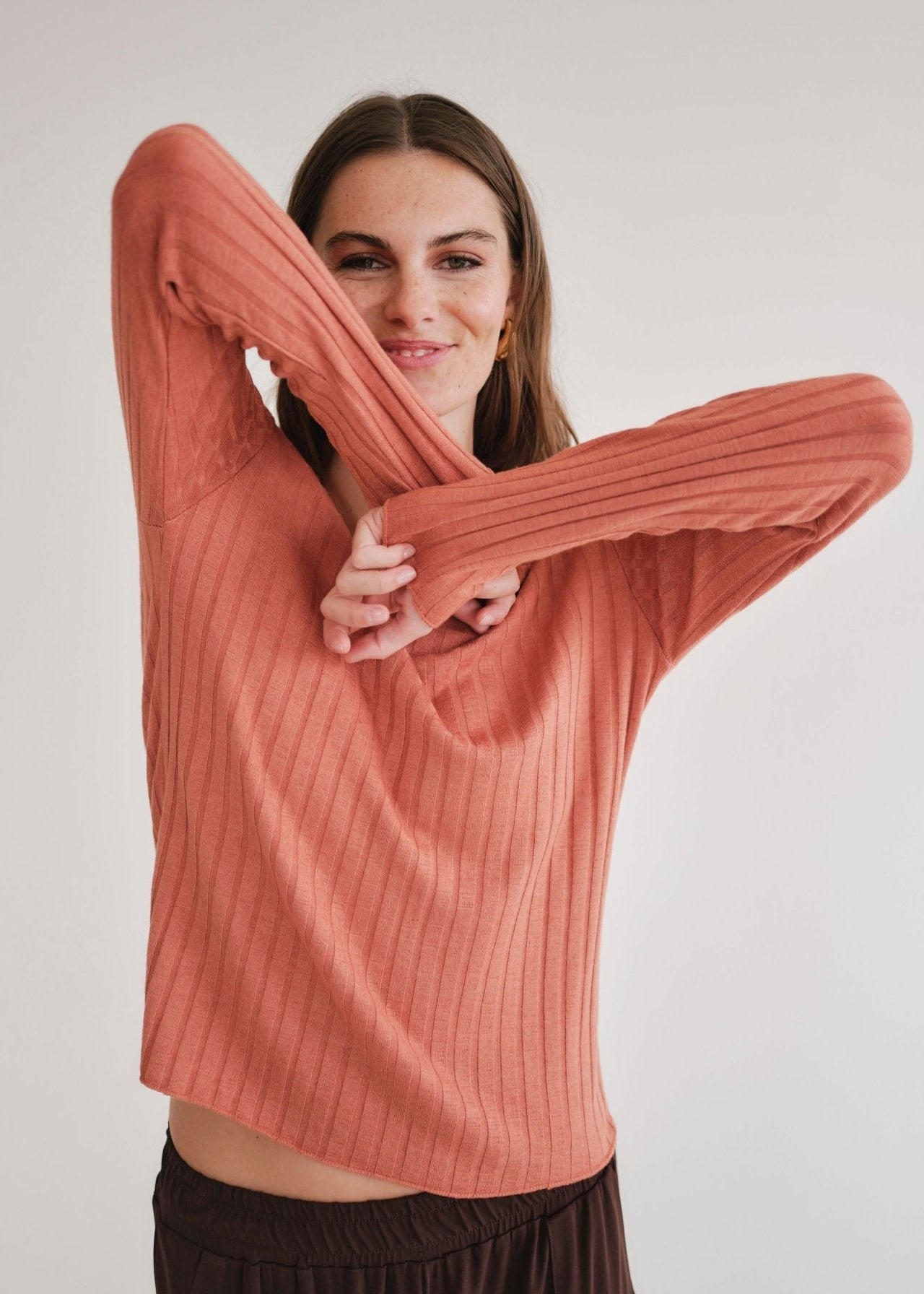 View our Italian V Neck Rib Knit in Rust - by Tribute Store