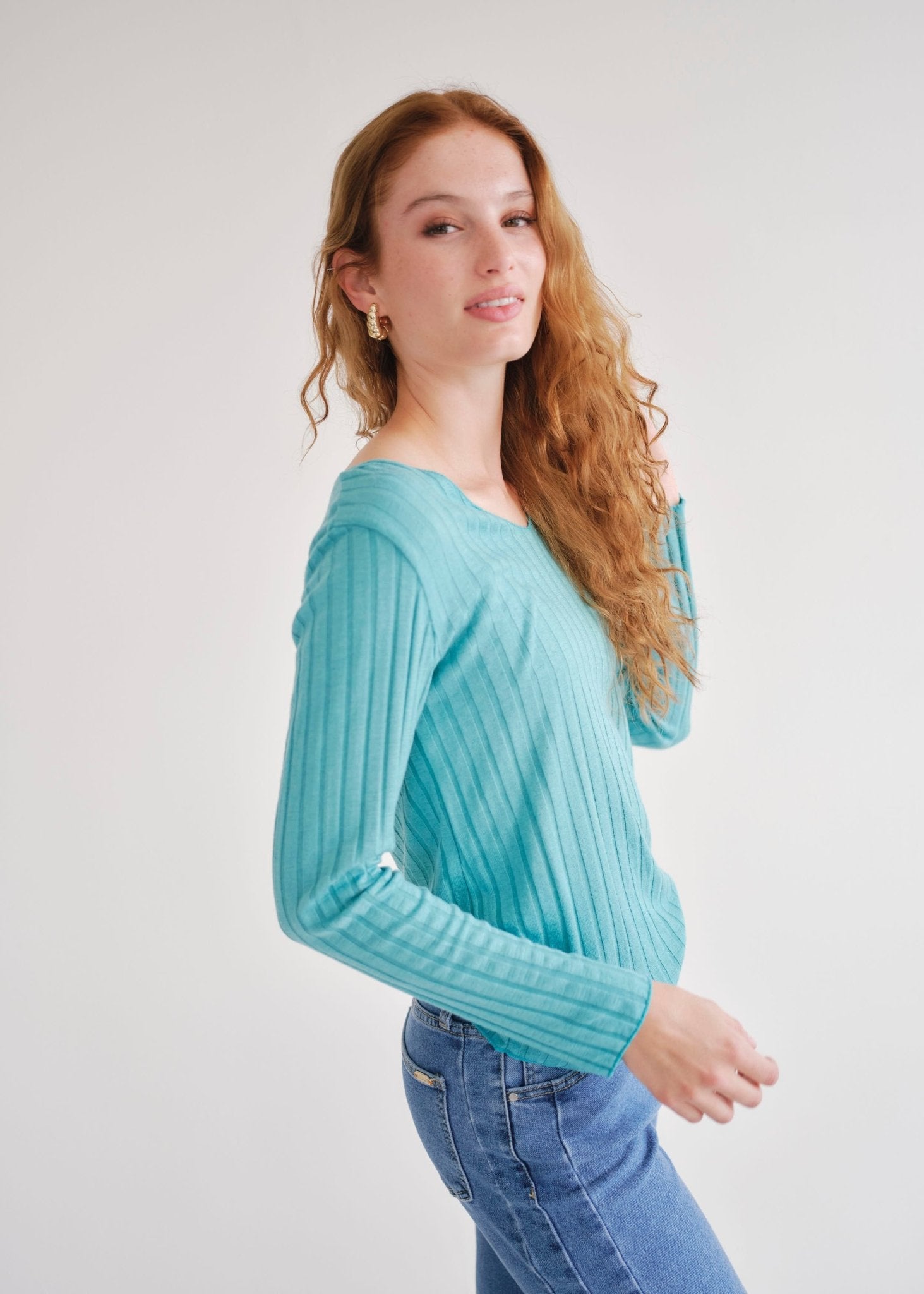 View our Italian V Neck Rib Knit in Turquoise - by Tribute Store