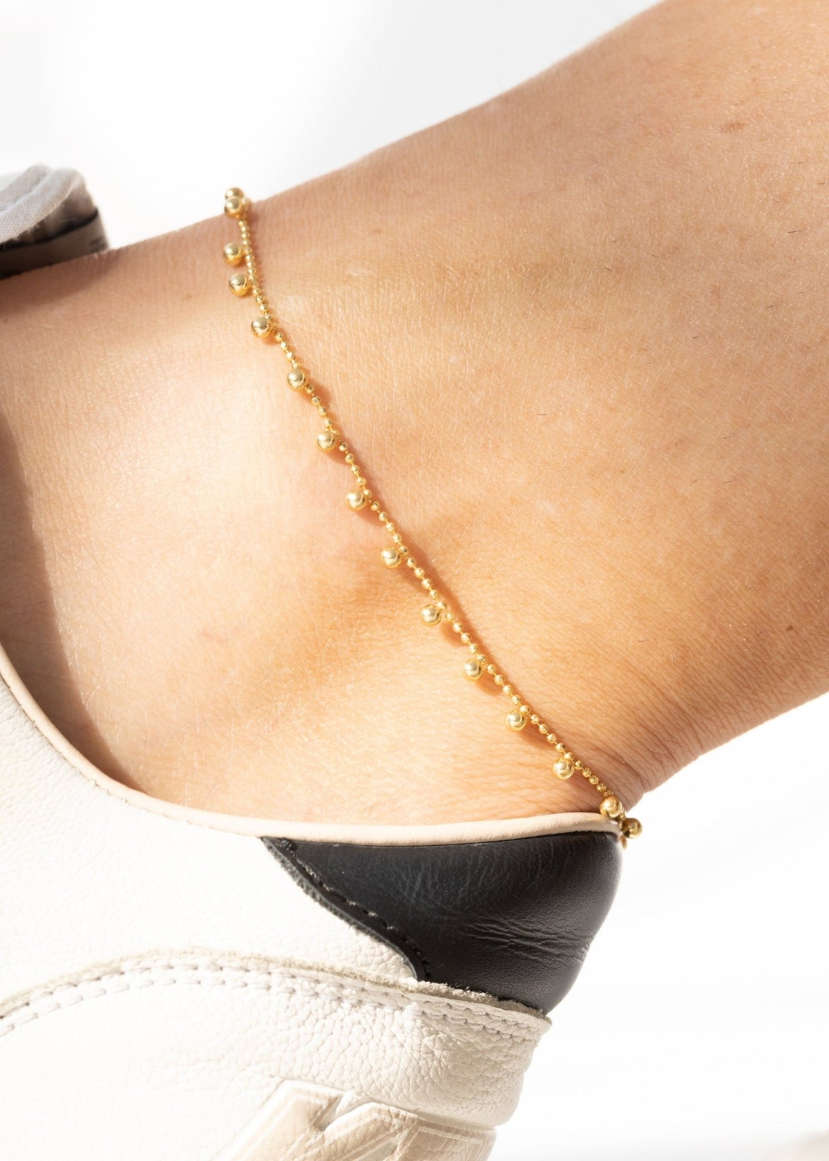 View our Italian Waterproof dangling ball Ankle Bracelet - by Tribute Store