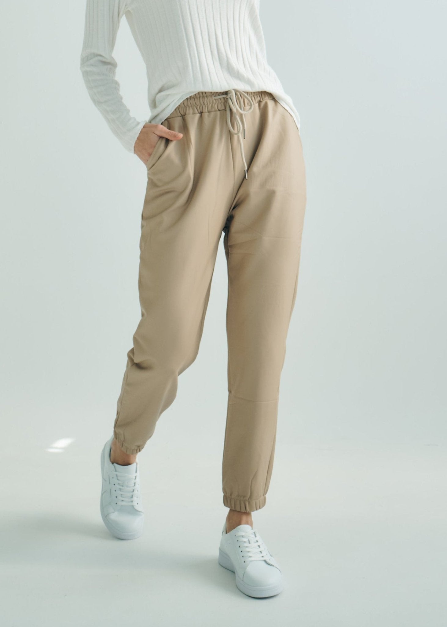 View our Jagger Vegan Leather Joggers in Beige - by Tribute Store