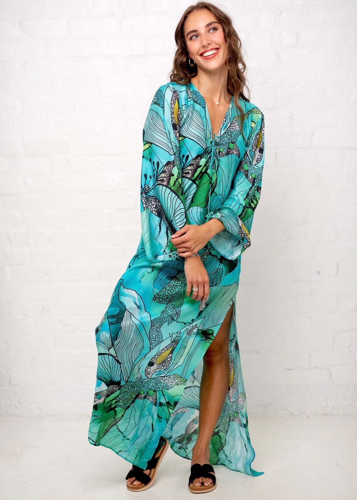 View our Lanira Dress in Green and Turquoise Flower Print - by Tribute Store