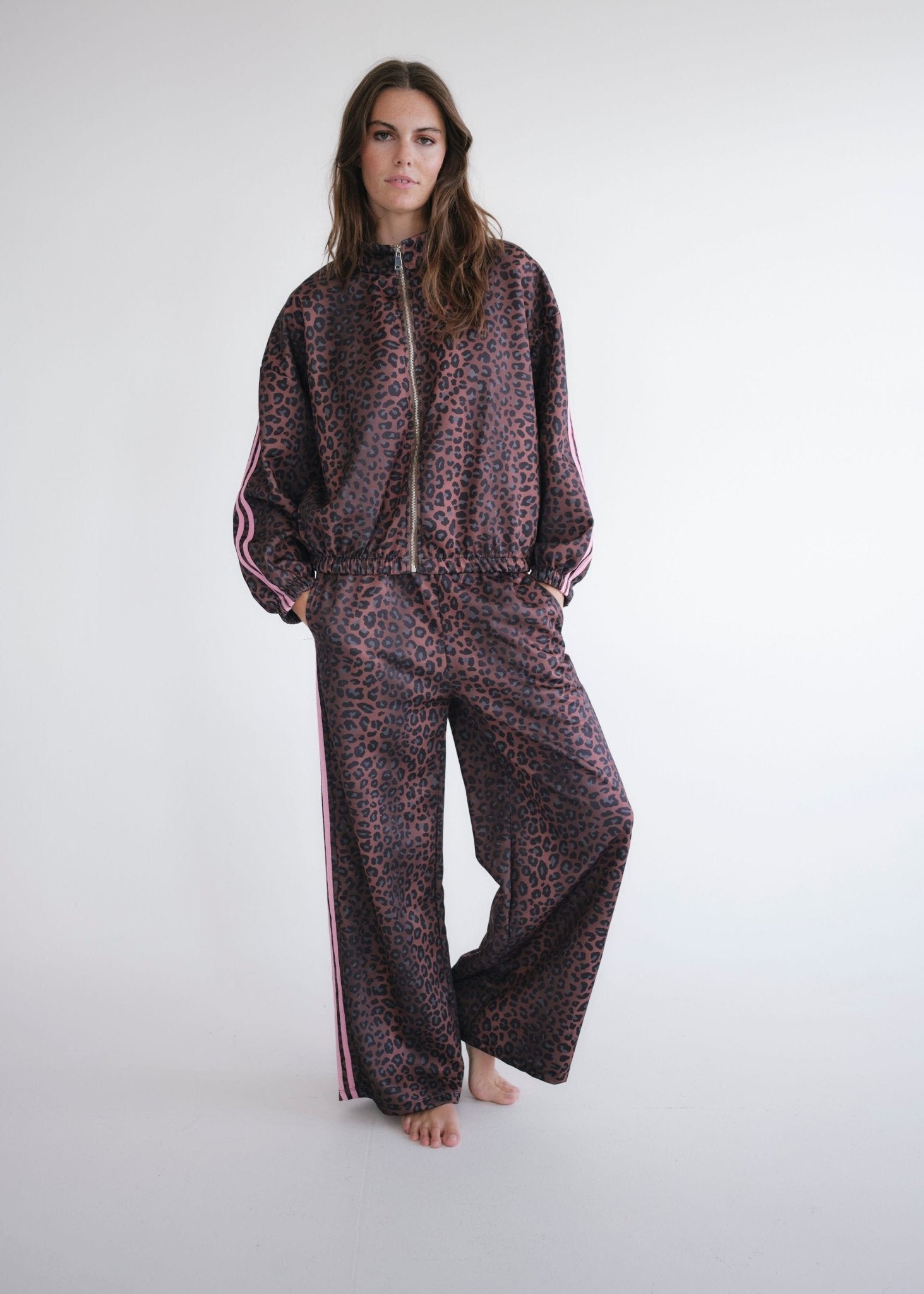 View our Leopard Rose Track Pants - by Tribute Store
