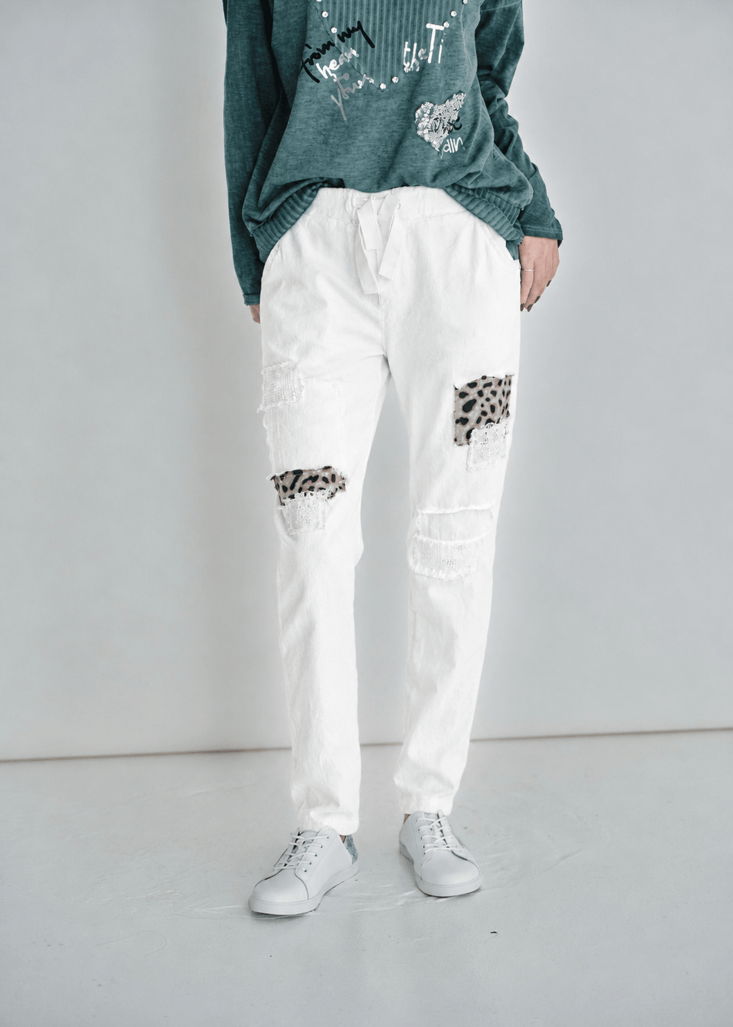 View our Leopard Sequin Joggers In White - by Tribute Store