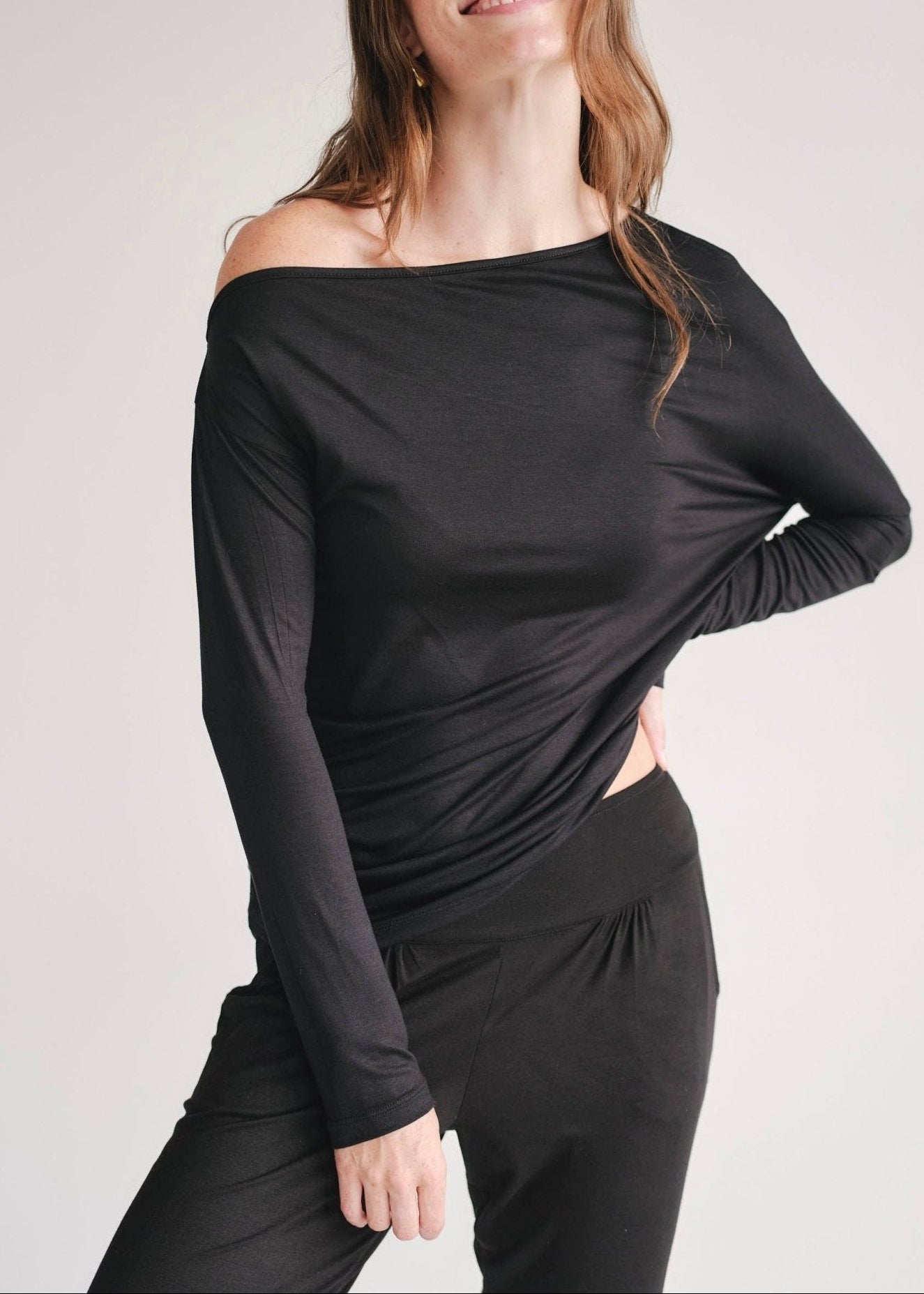 View our Long Sleeved Off The Shoulder Classic Top In Black - by Tribute Store