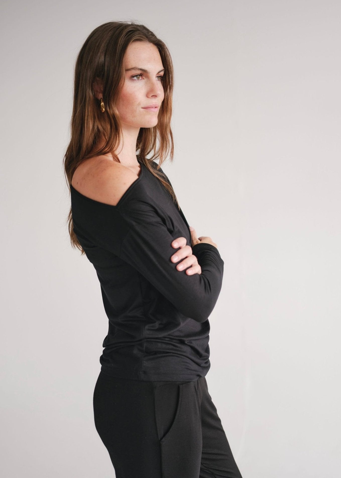 View our Long Sleeved Off The Shoulder Classic Top In Black - by Tribute Store