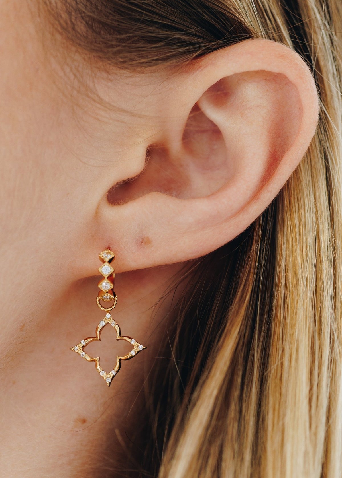 View our Lucky Sparkle Clover Gold Huggie Earrings - by Tribute Store