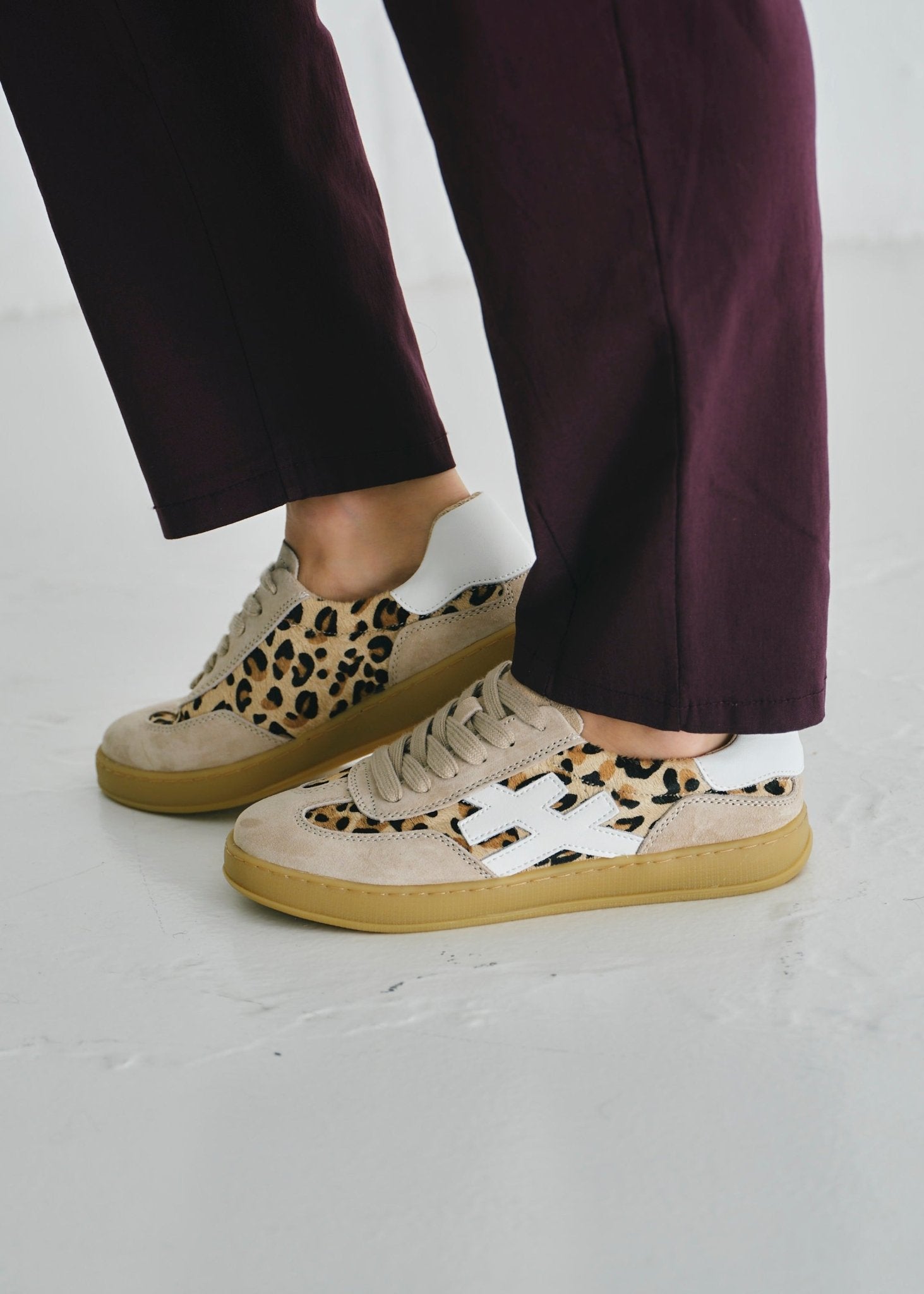 View our Lumi Leather Sneaker With Leopard Print In Beige And White - by Tribute Store