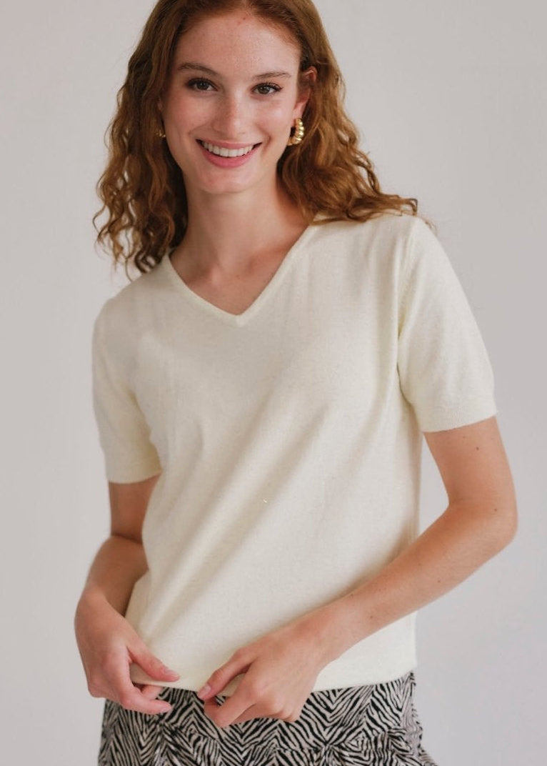 View our Lurex V Neck Tee with Shimmer Detail in Cream - by Tribute Store