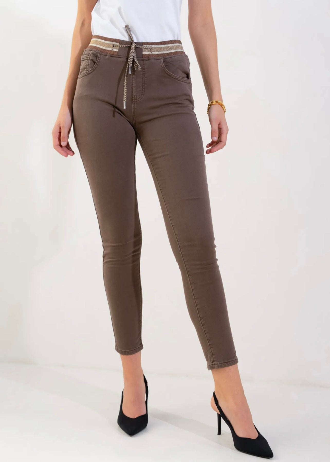 View our Mid - Rise Cotton Jogger Jeans in Chocolate with Gold Waist Band - by Tribute Store