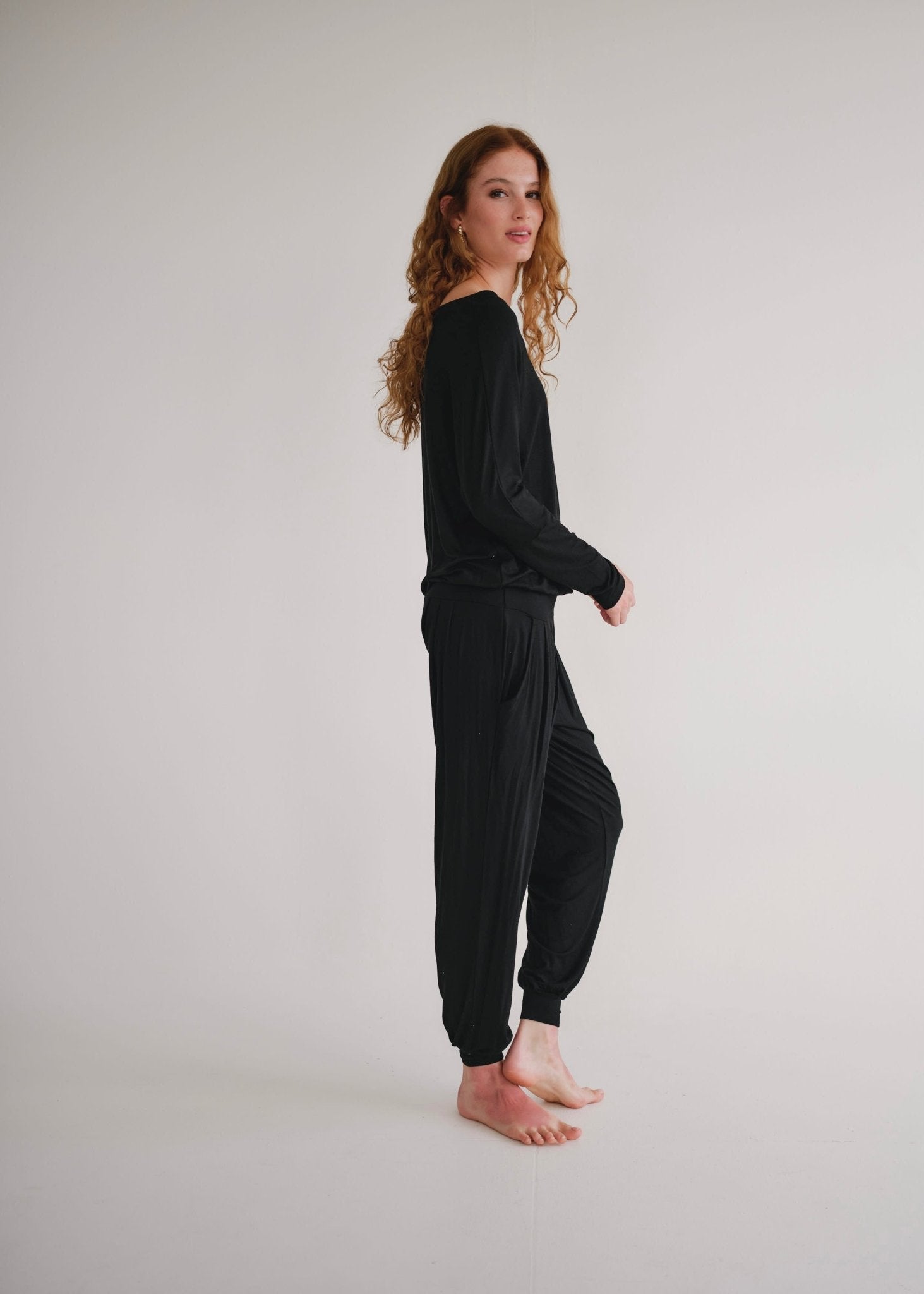 View our Mila Lounge Jumpsuit In Black - by Tribute Store