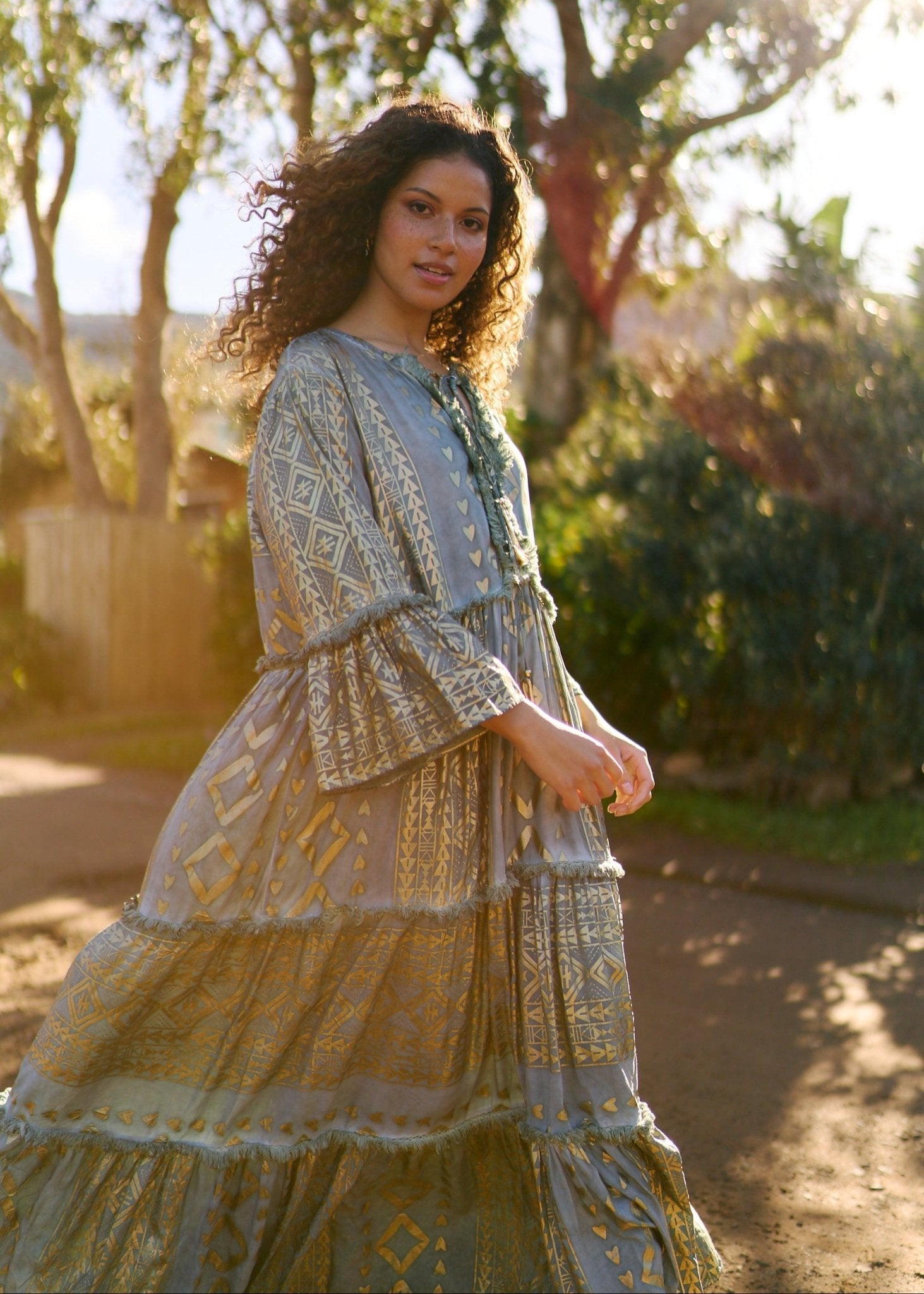 View our Phoebe Maxi Bohemian Dress with Front Tassels in Deep Green - by Tribute Store