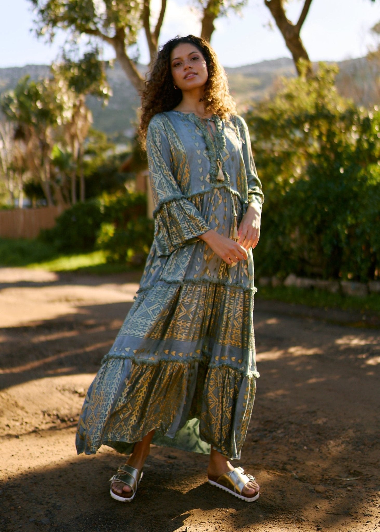 View our Phoebe Maxi Bohemian Dress with Front Tassels in Deep Green - by Tribute Store