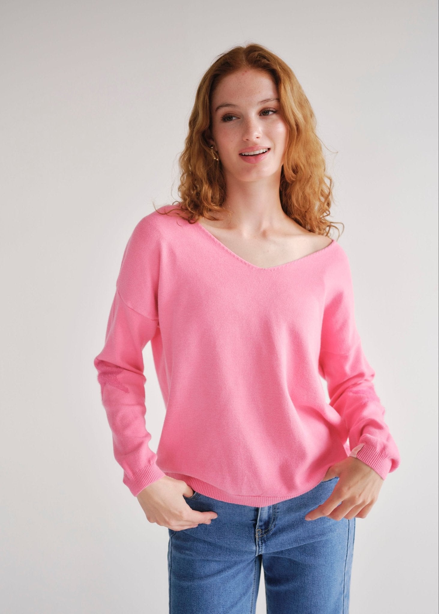View our Pink V Neck knit with Star on Elbow - by Tribute Store