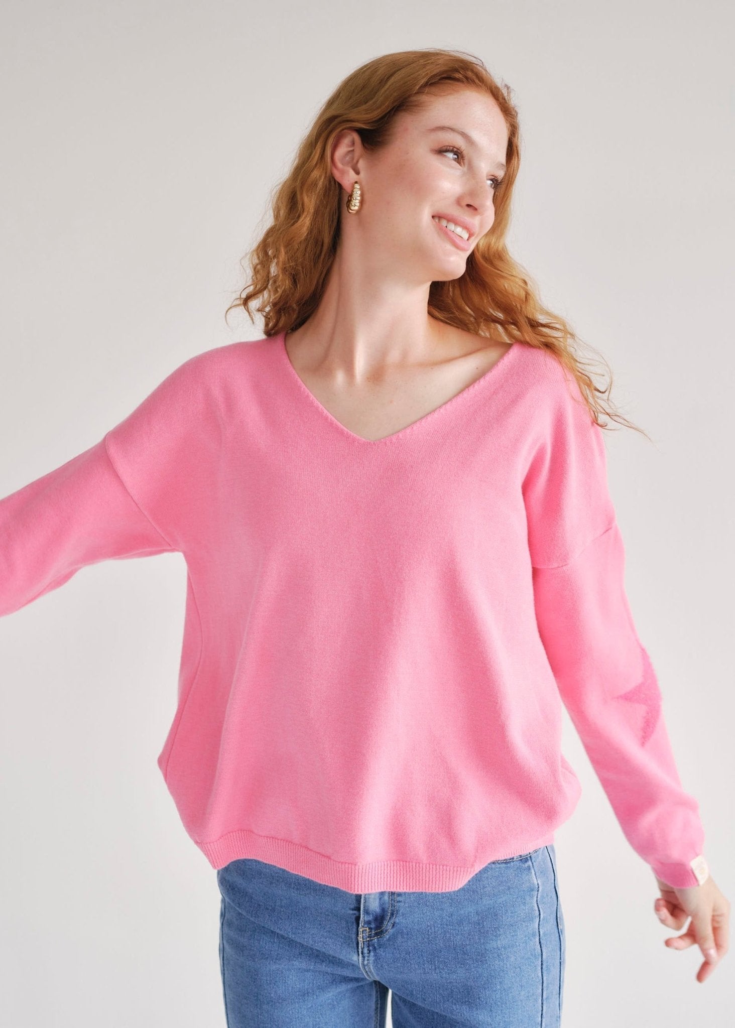 View our Pink V Neck knit with Star on Elbow - by Tribute Store