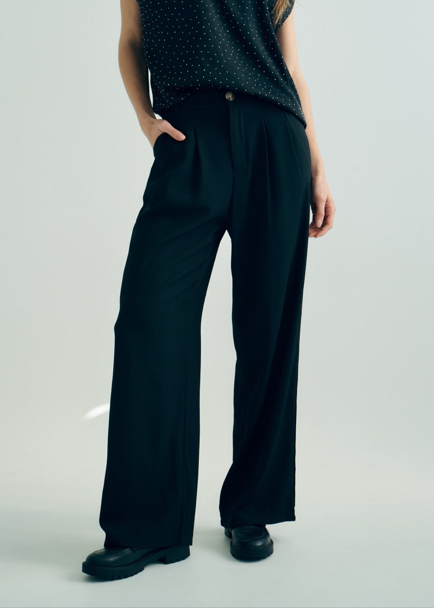 View our Pleated Trousers in Black - by Tribute Store