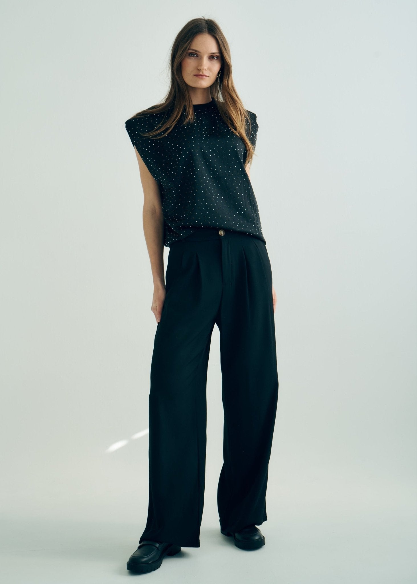 View our Pleated Trousers in Black - by Tribute Store
