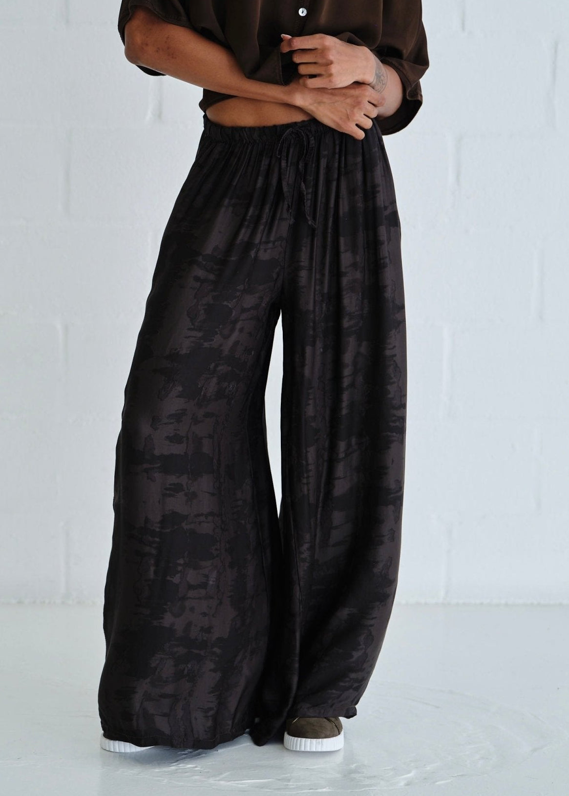 View our Satin Feel Palazzo Pants With Animal Print In Chocolate - by Tribute Store