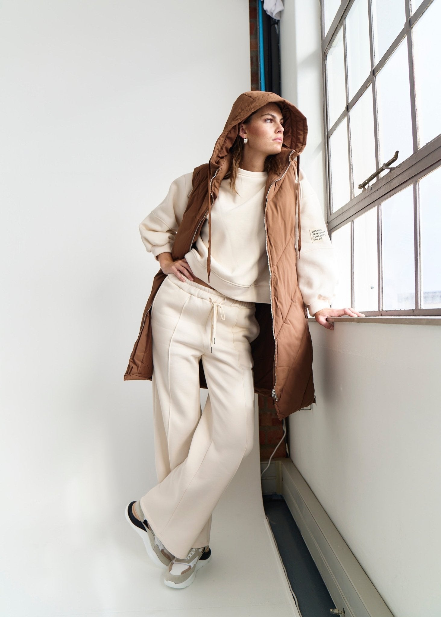 View our Scandi Sleeveless Down Feather Winter Puffer Jacket in Coffee - by Tribute Store