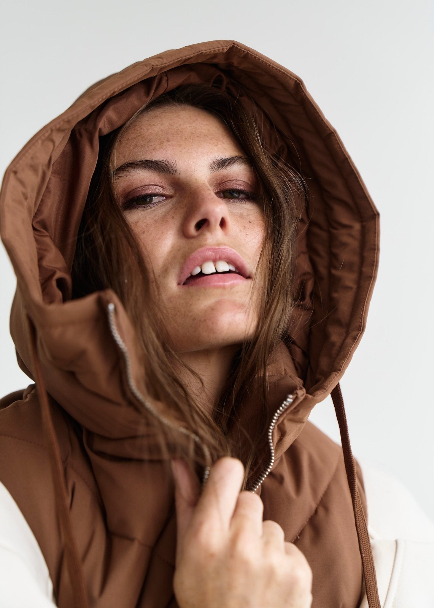 View our Scandi Sleeveless Down Feather Winter Puffer Jacket in Coffee - by Tribute Store