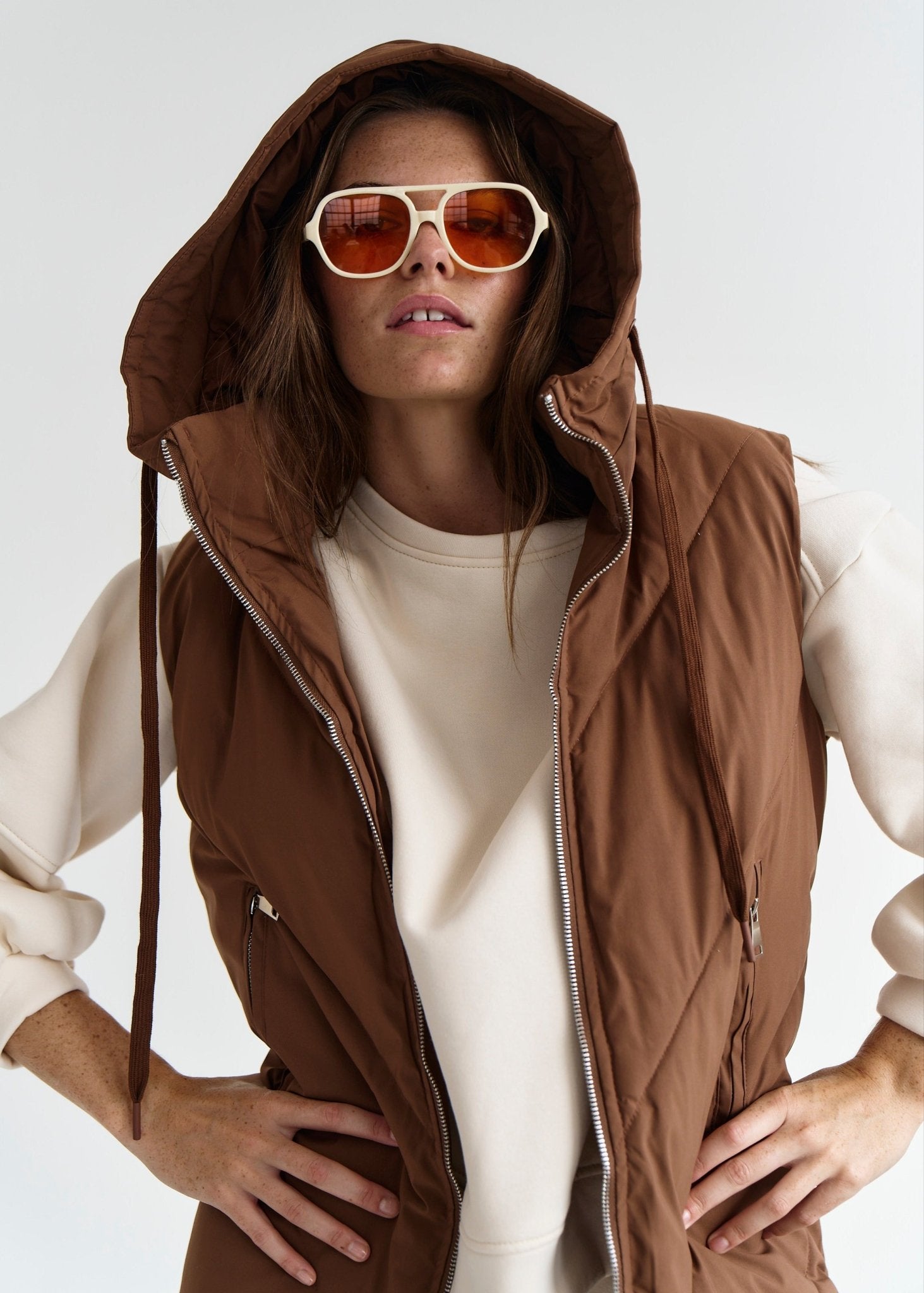 View our Scandi Sleeveless Down Feather Winter Puffer Jacket in Coffee - by Tribute Store