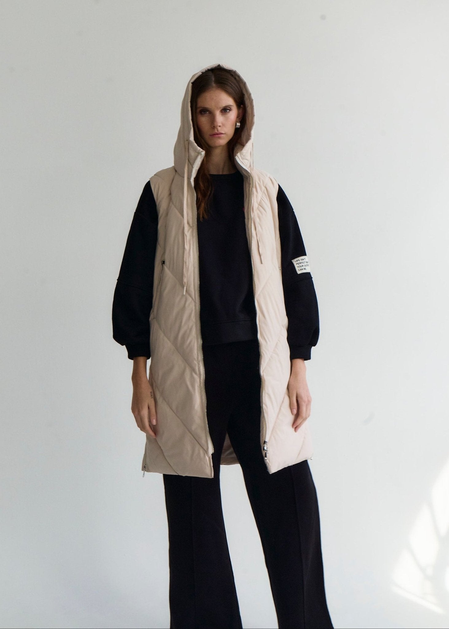 View our Scandi Sleeveless Down Feather Winter Puffer Jacket in Cream - by Tribute Store