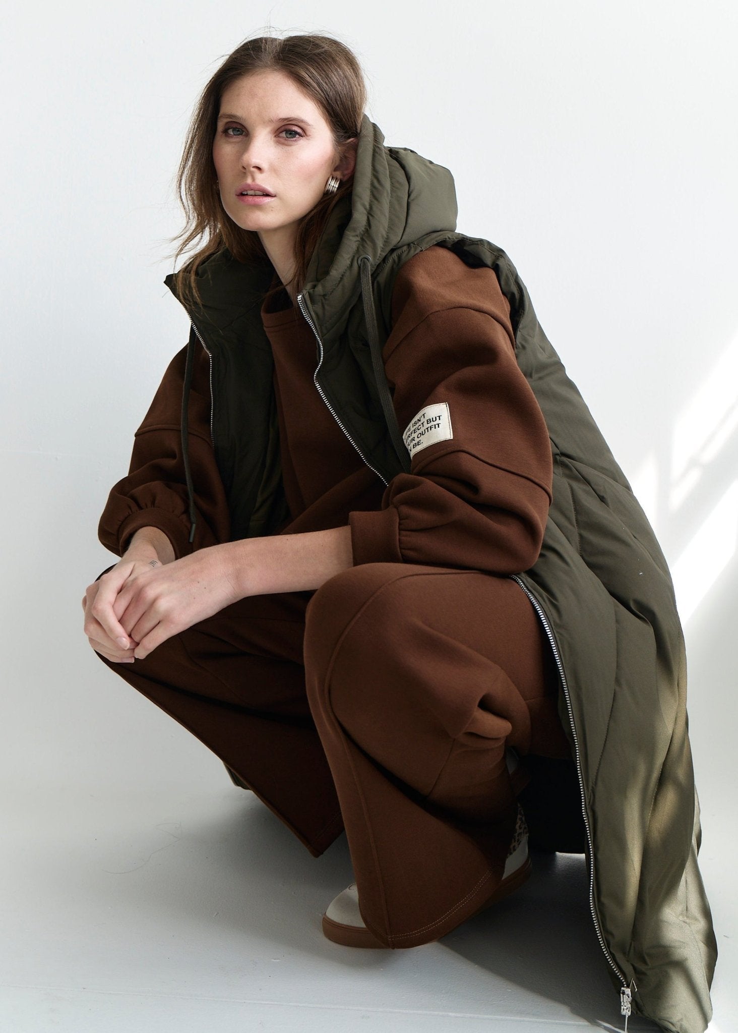 View our Scandi Sleeveless Down Feather Winter Puffer Jacket in Khaki - by Tribute Store