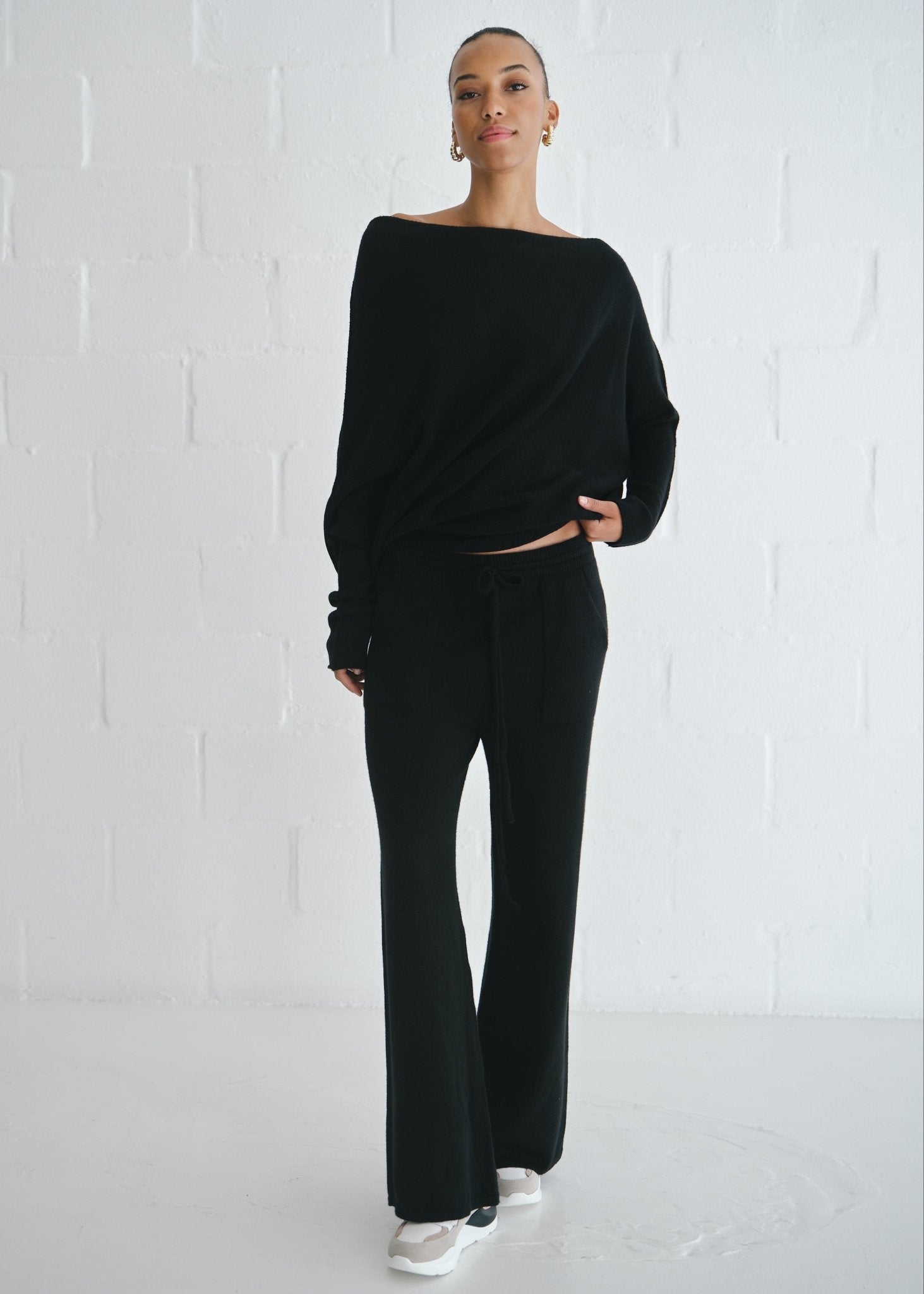 View our Sofia Italian Batwing Knit in Black - by Tribute Store