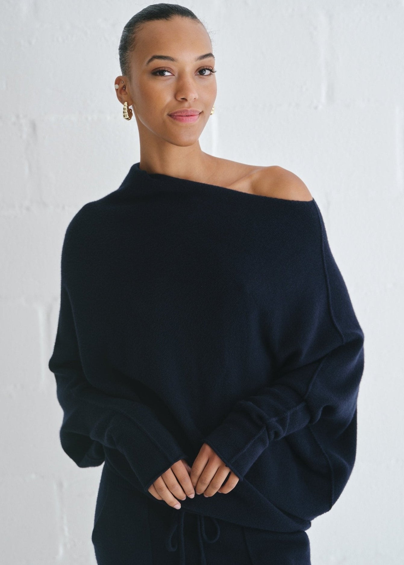 View our Sofia Italian Batwing Knit in Navy - by Tribute Store