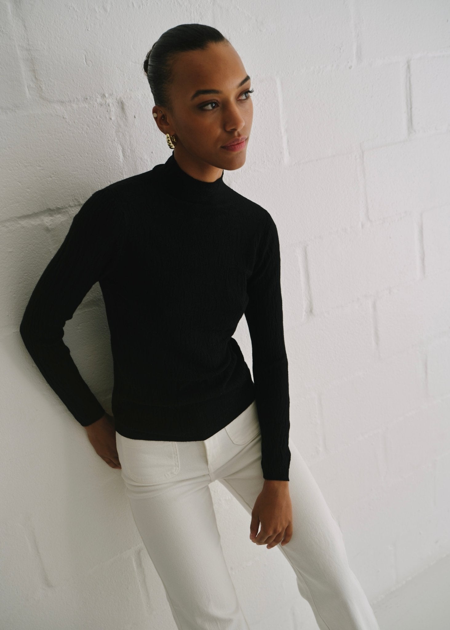 View our The Essential Black Embossed Turtleneck Knit - by Tribute Store