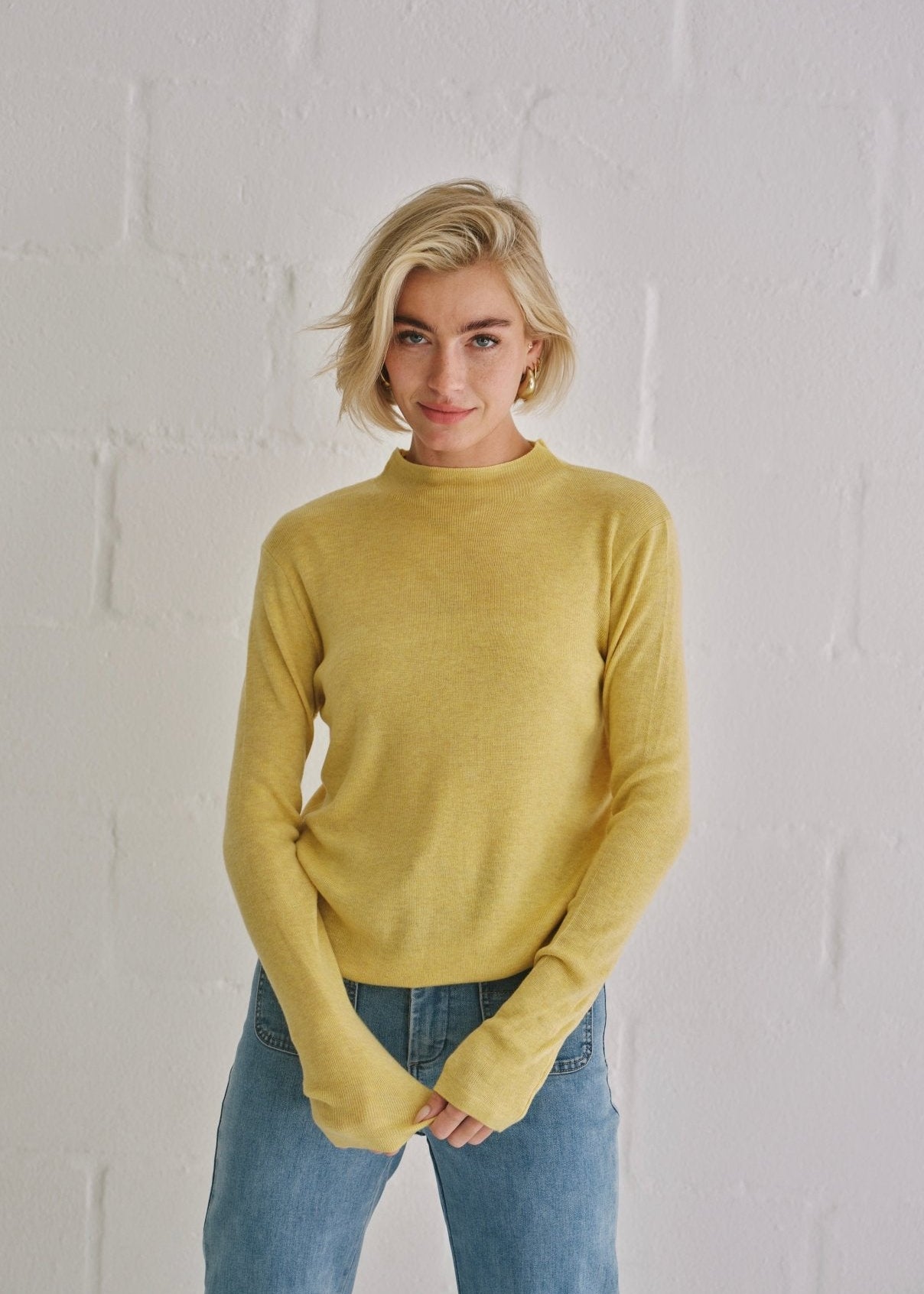 View our The Mock Neck Knit In Mustard - by Tribute Store